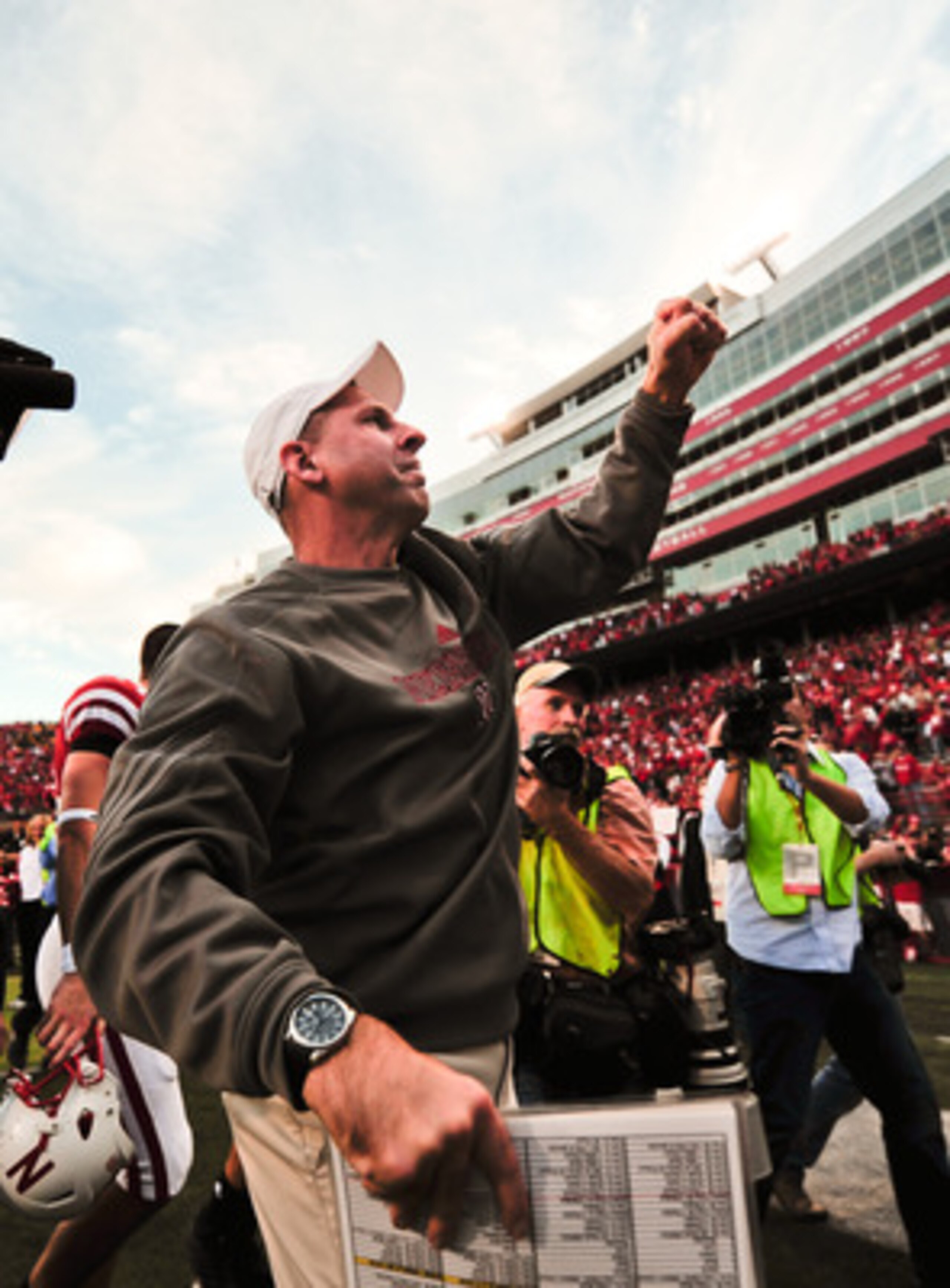 LINCOLN, NE - OCTOBER 30: Coach Bo Pelini of the Nebraska Cornhuskers pumps his fist to the Husker faithful after their game against the Missouri Tigers at Memorial Stadium on October 30, 2010 in Lincoln, Nebraska. Nebraska Defeated Missouri 31-17. (Photo