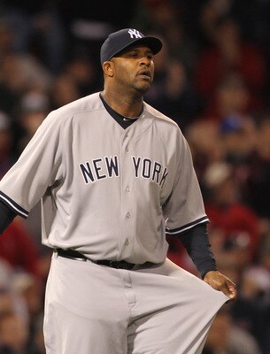 BOSTON, MA - APRIL 10:  CC Sabathia #52 of the New York Yankees reacts during a game against the Boston Red Sox at Fenway Park April 10, 2011 in Boston, Massachusetts. (Photo by Jim Rogash/Getty Images)