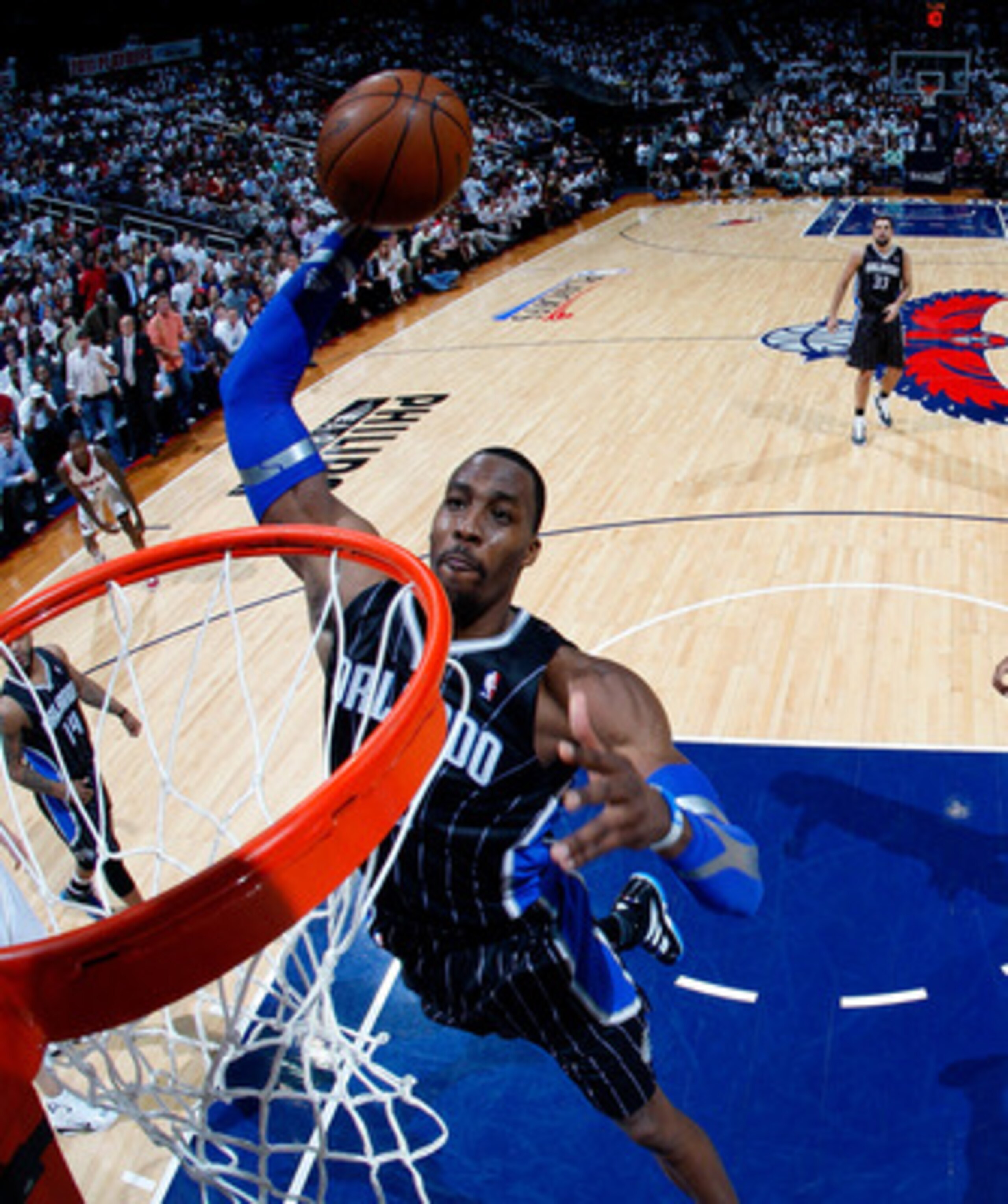 ATLANTA, GA - APRIL 28:  Dwight Howard #12 of the Orlando Magic dunks against the Atlanta Hawks during Game Six of the Eastern Conference Quarterfinals in the 2011 NBA Playoffs at Philips Arena on April 28, 2011 in Atlanta, Georgia.  NOTE TO USER: User ex