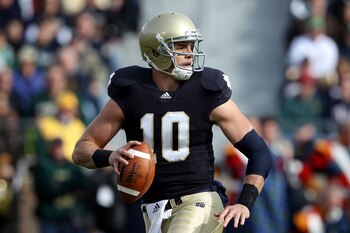SOUTH BEND, IN - OCTOBER 30: Dayne Crist #10 of the Notre Dame Fighting Irish looks for a receiver against the Tulsa Golden Hurricane at Notre Dame Stadium on October 30, 2010 in South Bend, Indiana. Tulsa defeated Notre Dame 28-27. (Photo by Jonathan Dan SOUTH BEND, IN - OCTOBER 30: Dayne Crist #10 of the Notre Dame Fighting Irish looks for a receiver against the Tulsa Golden Hurricane at Notre Dame Stadium on October 30, 2010 in South Bend, Indiana. Tulsa defeated Notre Dame 28-27. (Photo by Jonathan Dan