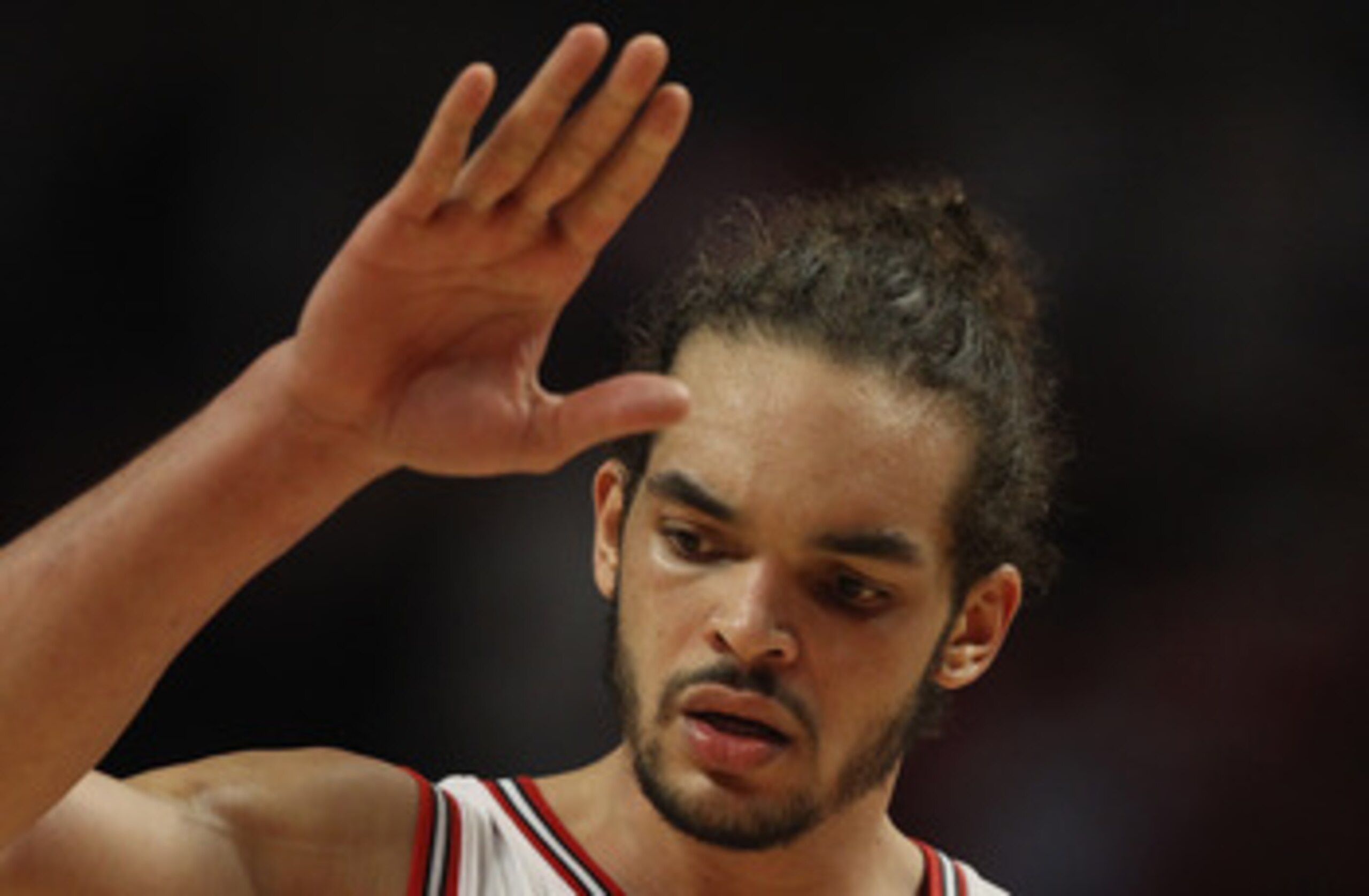 CHICAGO, IL - MAY 04: Joakim Noah #13 of the Chicago Bulls celebrates a win over the Atlanta Hawks in Game Two of the Eastern Conference Semifinals in the 2011 NBA Playoffs at the United Center on May 4, 2011 in Chicago, Illinois. The Bulls defeated the H