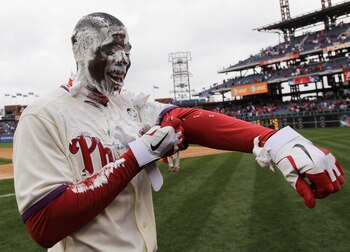 PHILADELPHIA, PA - APRIL 01:  John Mayberry Jr. #14 of the Philadelphia Phillies smiles after getting hit with a cream pie after driving in the game winning run to defeat the Houston Astros 5-4 on opening day at Citizens Bank Park on April 1, 2011 in Phil
