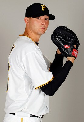 BRADENTON, FL - FEBRUARY 20:  Pitcher Scott Olsen #26 of the Pittsburgh Pirates poses for a photo during photo day at Pirate City on February 20, 2011 in Bradenton, Florida.  (Photo by J. Meric/Getty Images)
