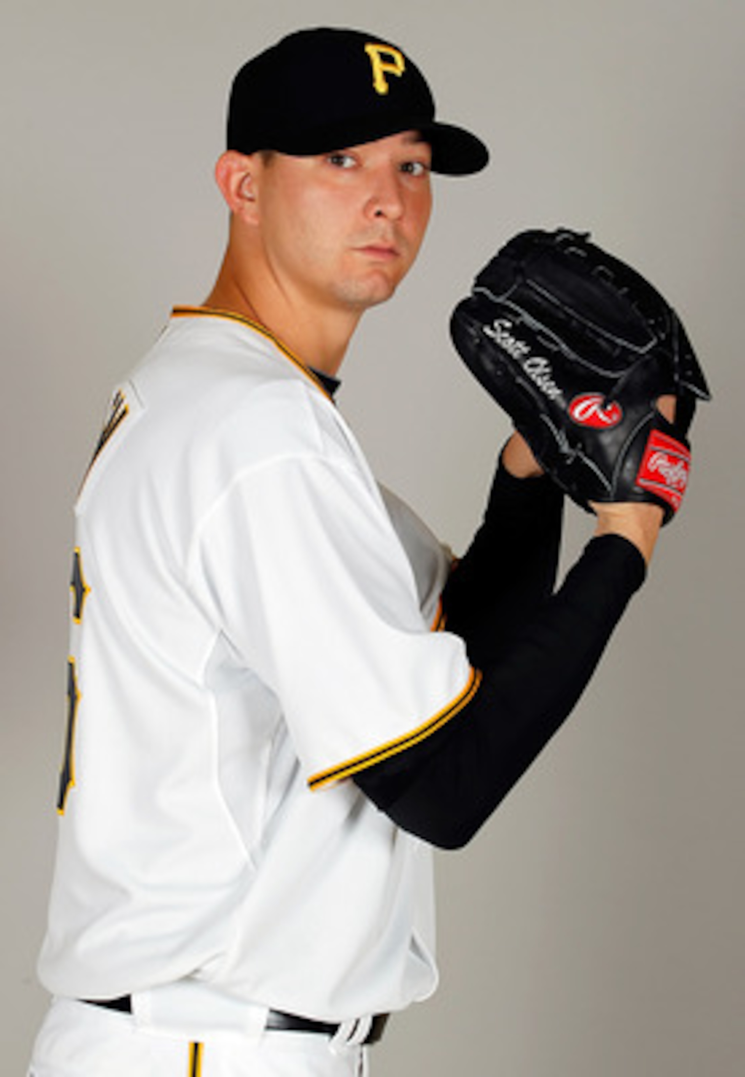 BRADENTON, FL - FEBRUARY 20:  Pitcher Scott Olsen #26 of the Pittsburgh Pirates poses for a photo during photo day at Pirate City on February 20, 2011 in Bradenton, Florida.  (Photo by J. Meric/Getty Images)