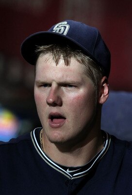 PHOENIX - SEPTEMBER 01:  Starting pitcher Mat Latos #38 of the San Diego Padres in the dugout during the Major League Baseball game against the Arizona Diamondbacks at Chase Field on September 1, 2010 in Phoenix, Arizona. The Diamondbacks defeated the Pad