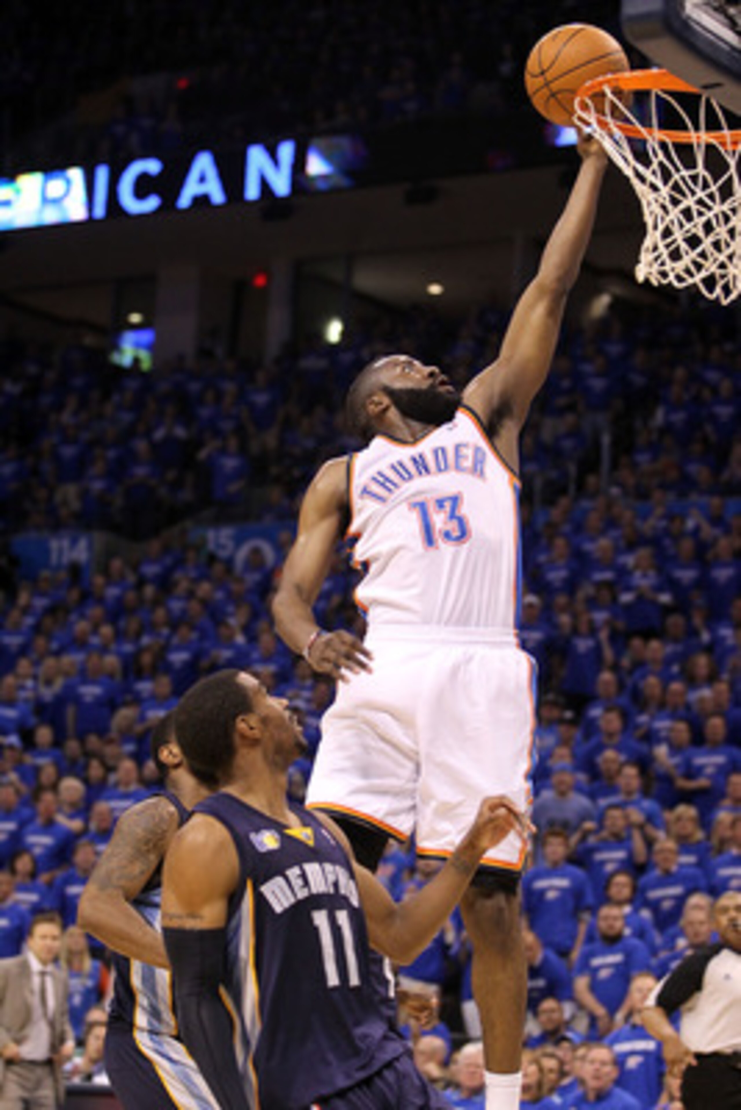OKLAHOMA CITY, OK - MAY 03:  Guard James Harden #13 of the Oklahoma City Thunder takes a shot against Mike Conley #11 of the Memphis Grizzlies in Game Two of the Western Conference Semifinals in the 2011 NBA Playoffs on May 3, 2011 at Oklahoma City Arena 