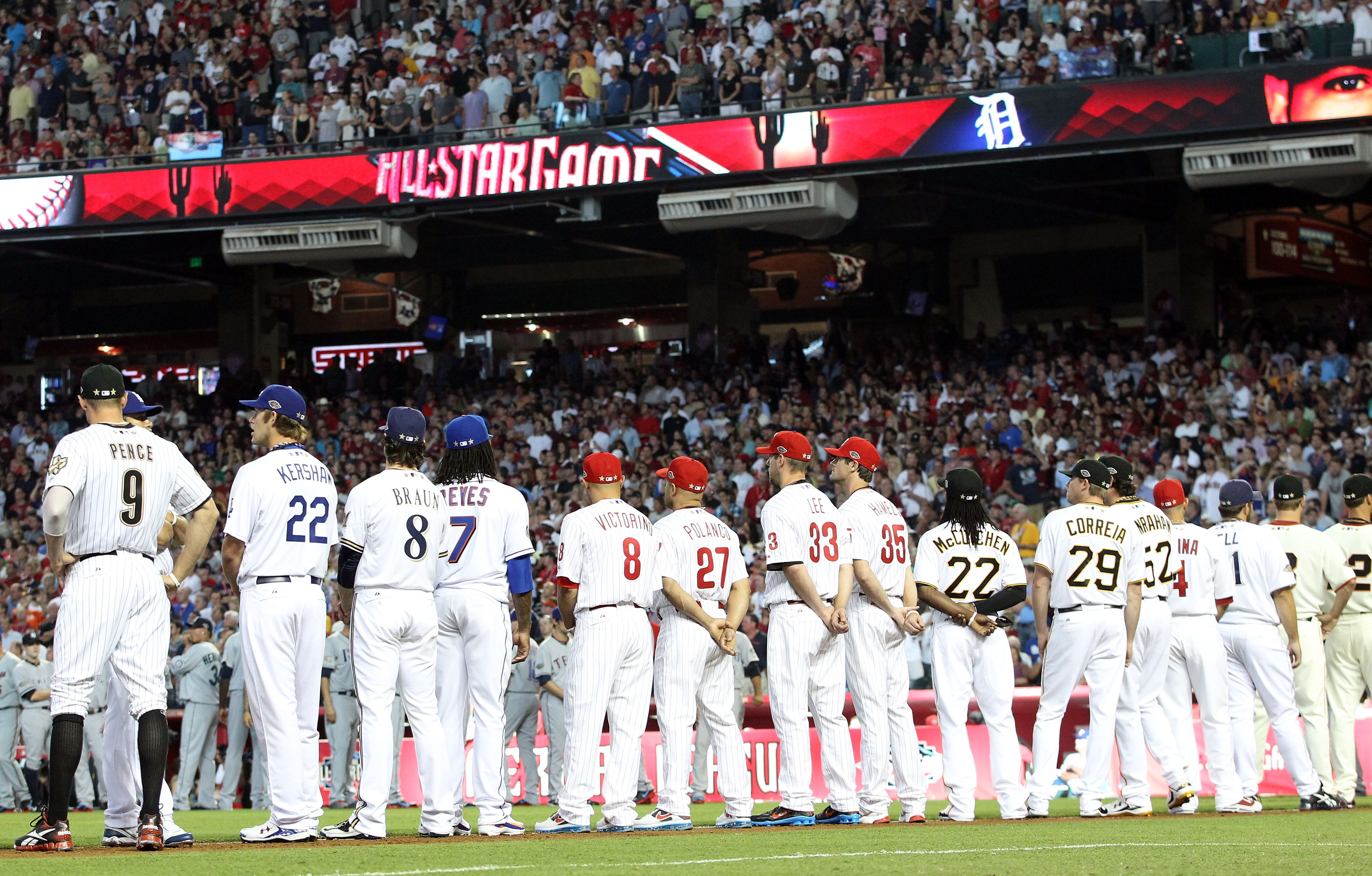 PHOENIX, AZ - JULY 12:  The National League All-Stars stand on the third base line before the start of the 82nd MLB All-Star Game at Chase Field on July 12, 2011 in Phoenix, Arizona.  (Photo by Christian Petersen/Getty Images)