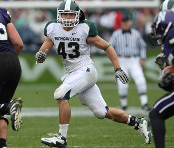 EVANSTON, IL - OCTOBER 23: Eric Gordon #43 of the Michigan State Spartans follows a play against the Northwestern Wildcats at Ryan Field on October 23, 2010 in Evanston, Illinois. Michigan State defeated Northwestern 35-27. (Photo by Jonathan Daniel/Getty