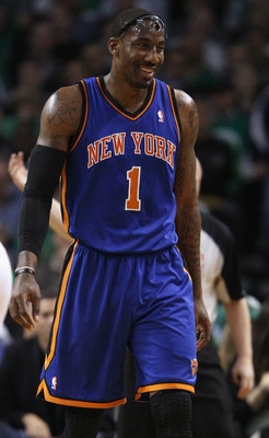 BOSTON, MA - APRIL 19:  Amare Stoudemire #1 of the New York Knicks walks out on the court after a time out in the first quarter against the Boston Celtics  in Game Two of the Eastern Conference Quarterfinals in the 2011 NBA Playoffs on April 19, 2011 at t