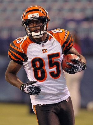 INDIANAPOLIS - SEPTEMBER 02:  Chad Ochocinco #85 of the Cincinnati Bengals runs with the ball before the NFL preseason game against the Indianapolis Colts at Lucas Oil Stadium on September 2, 2010 in Indianapolis, Indiana.  (Photo by Andy Lyons/Getty Imag