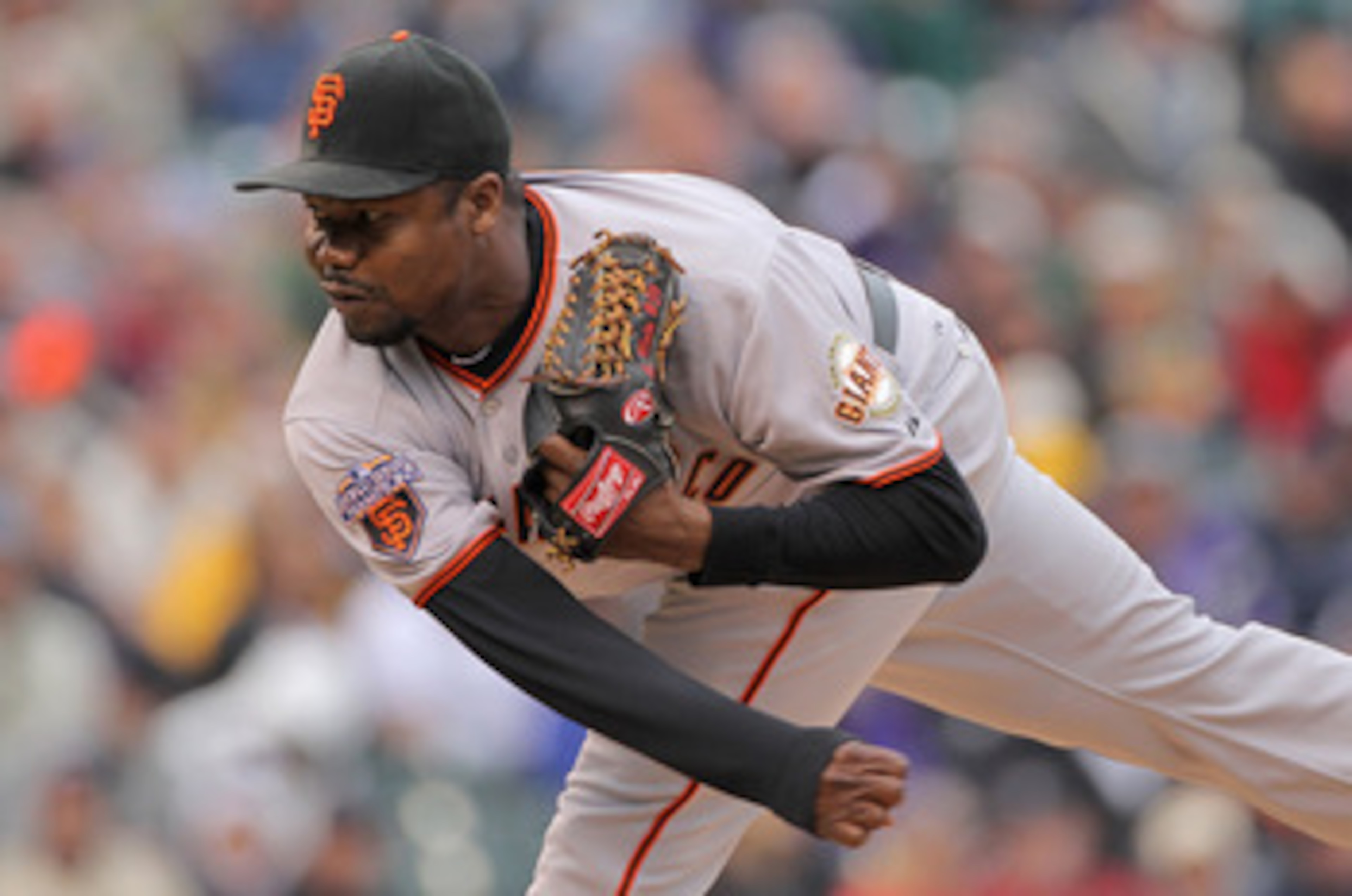 DENVER, CO - APRIL 20: Relief pitcher Guillermo Mota #59 of the San Francisco Giants delivers against the Colorado Rockies at Coors Field on April 20, 2011 in Denver, Colorado. (Photo by Doug Pensinger/Getty Images) DENVER, CO - APRIL 20: Relief pitcher Guillermo Mota #59 of the San Francisco Giants delivers against the Colorado Rockies at Coors Field on April 20, 2011 in Denver, Colorado. (Photo by Doug Pensinger/Getty Images)