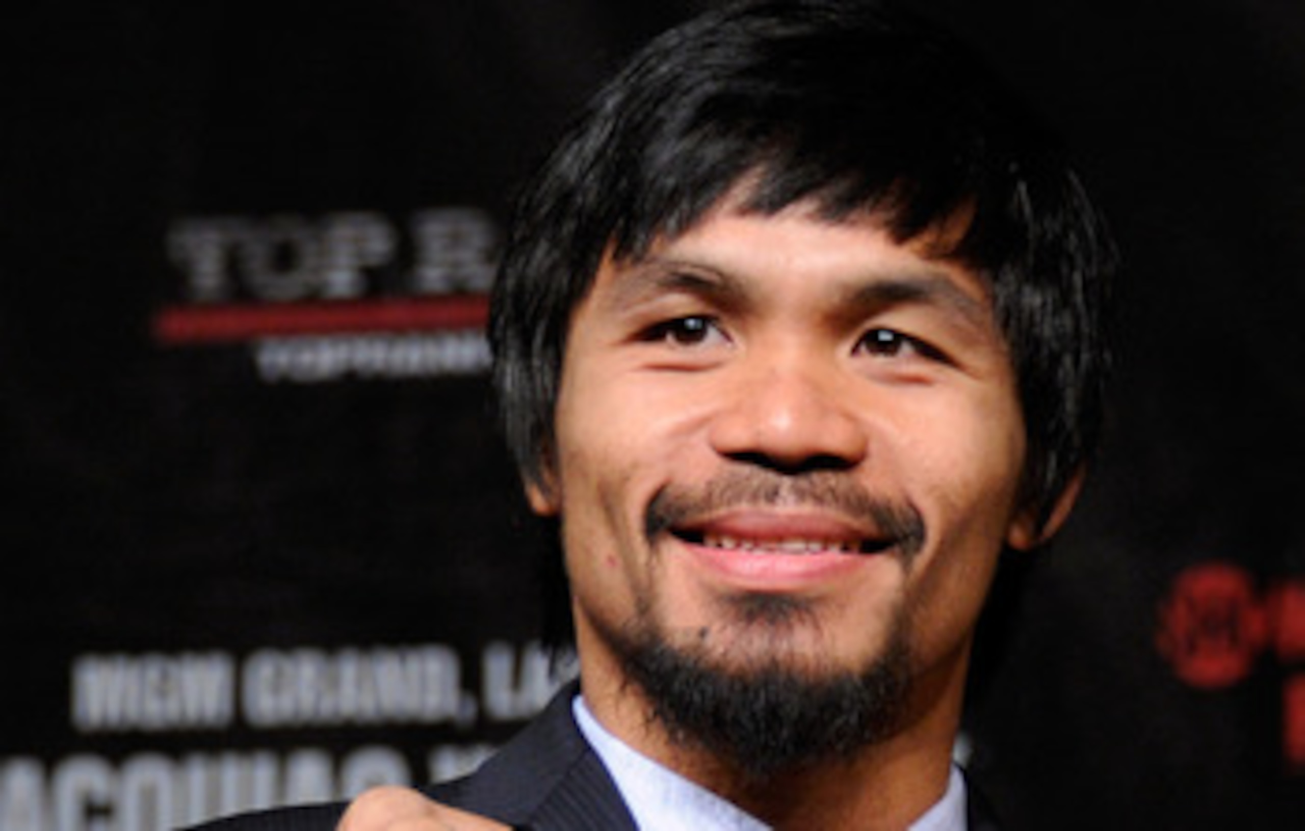 LAS VEGAS, NV - MAY 04:  Boxer Manny Pacquiao poses during the final news conference for his bout against Shane Mosley at the MGM Grand Hotel/Casino May 4, 2011 in Las Vegas, Nevada. Pacquiao will defend his WBO welterweight title against Mosley on May 7,