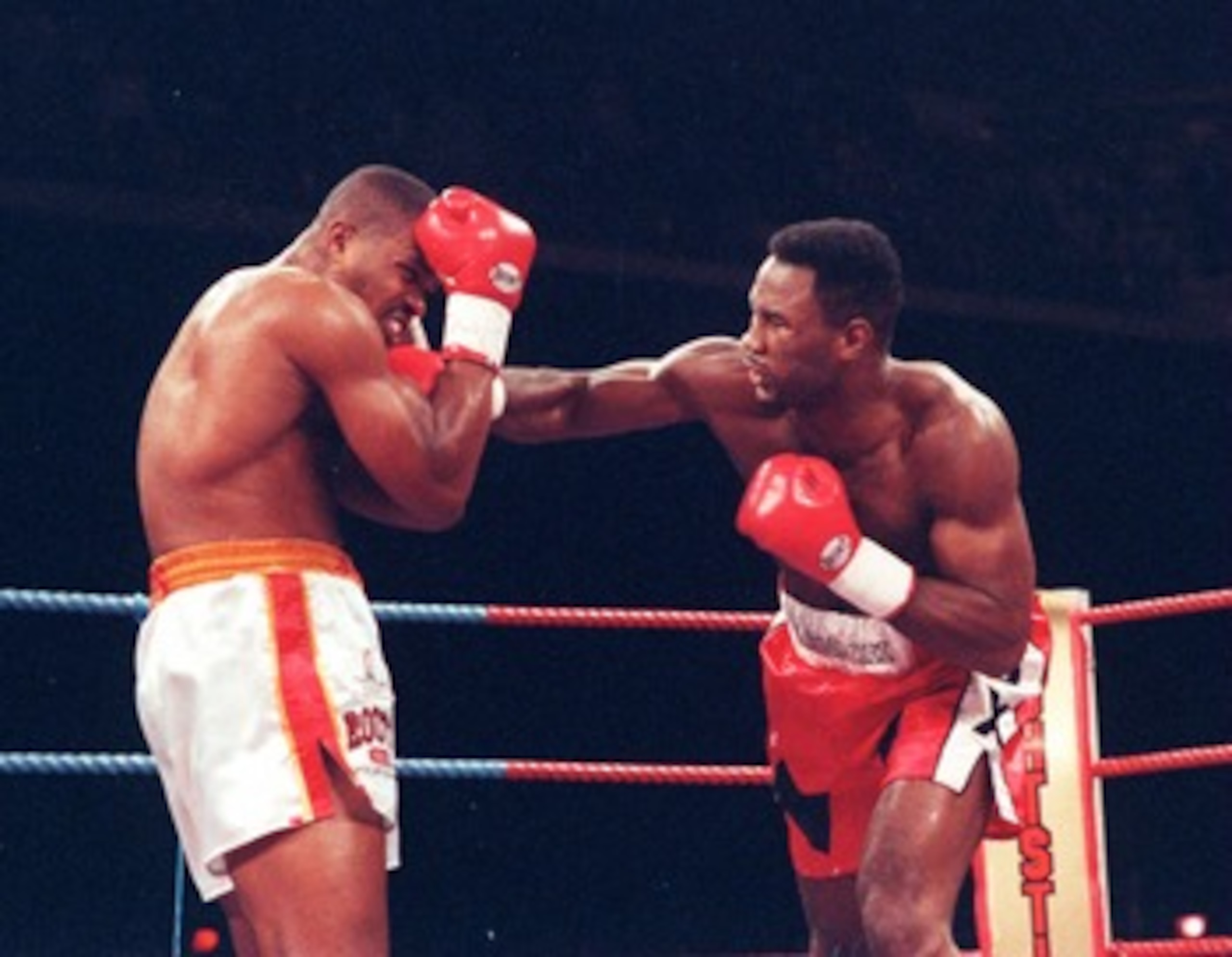Dec 1992:  Lennox Lewis of Great Britain lands a punch on thejaw of Razor Ruddock during their non title fight in London England. Lewis won the fight with a T.K.O in the Second round.