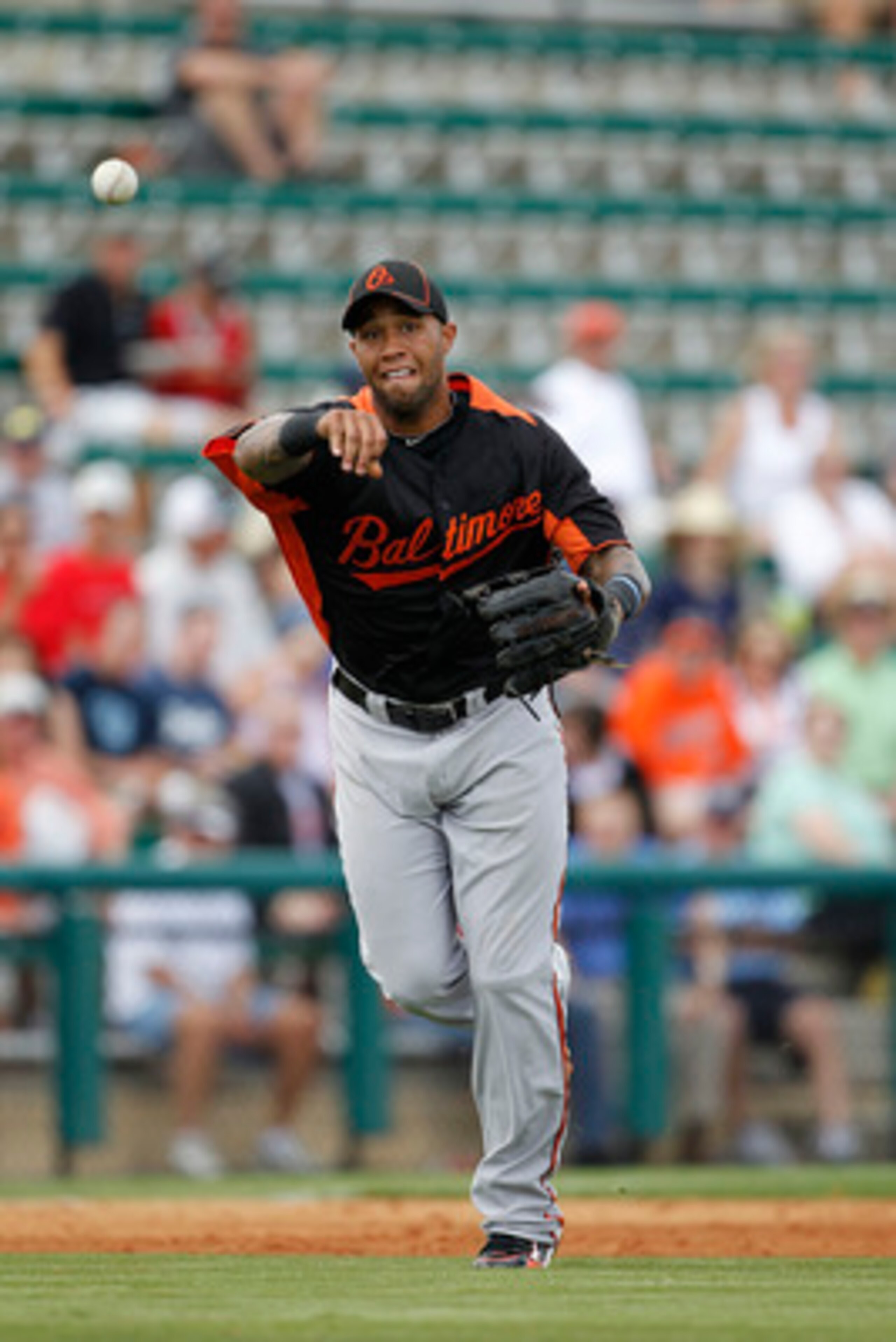 LAKELAND, FL - MARCH 04: Josh Bell #37 of the Baltimore Orioles throws to first base during the game against the Detroit Tigers at Joker Marchant Stadium on March 4, 2011 in Lakeland, Florida. The Orioles defeated the Tigers 6-2. Photo by Leon Halip/Getty