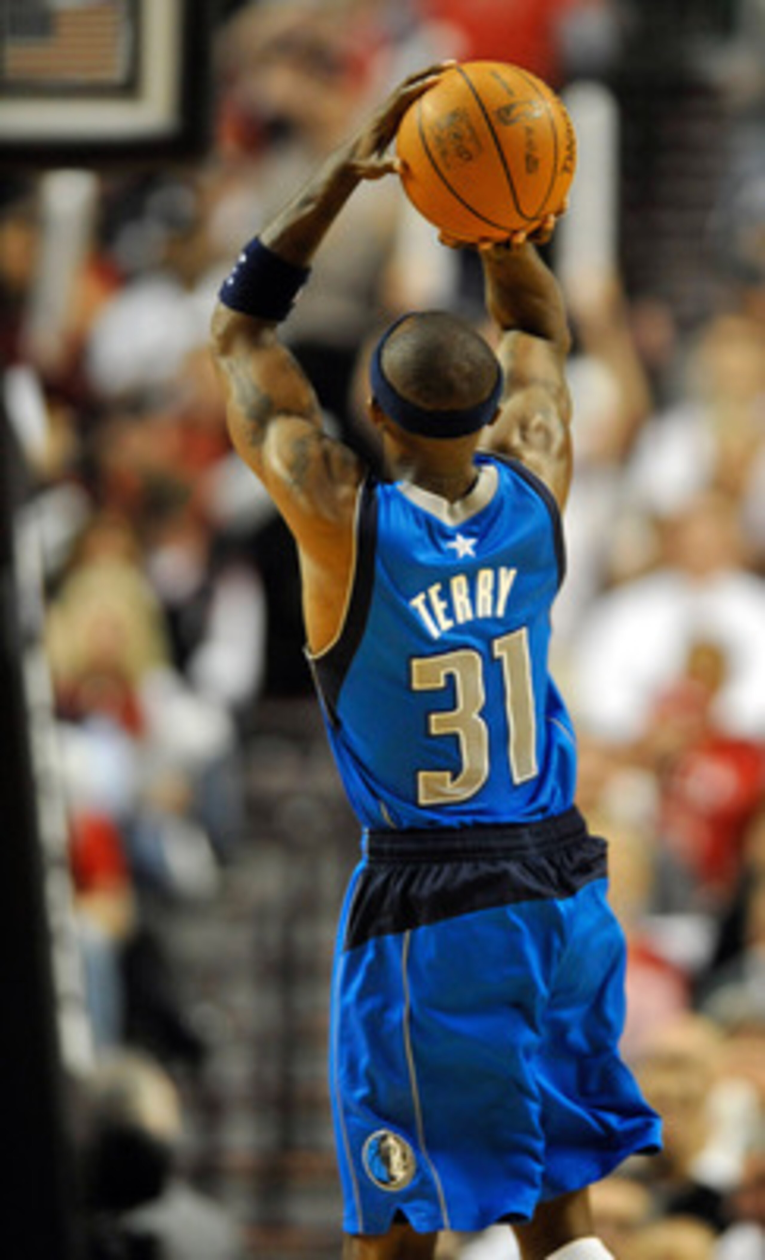 PORTLAND, OR - APRIL 28: Jason Terry #31 of the Dallas Mavericks hits a three-point shot during the fourth quarter of Game Six of the Western Conference Quartefinals against the Portland Trail Blazers in the 2011 NBA Playsoffs on April 28, 2011 at the Ros PORTLAND, OR - APRIL 28: Jason Terry #31 of the Dallas Mavericks hits a three-point shot during the fourth quarter of Game Six of the Western Conference Quartefinals against the Portland Trail Blazers in the 2011 NBA Playsoffs on April 28, 2011 at the Ros