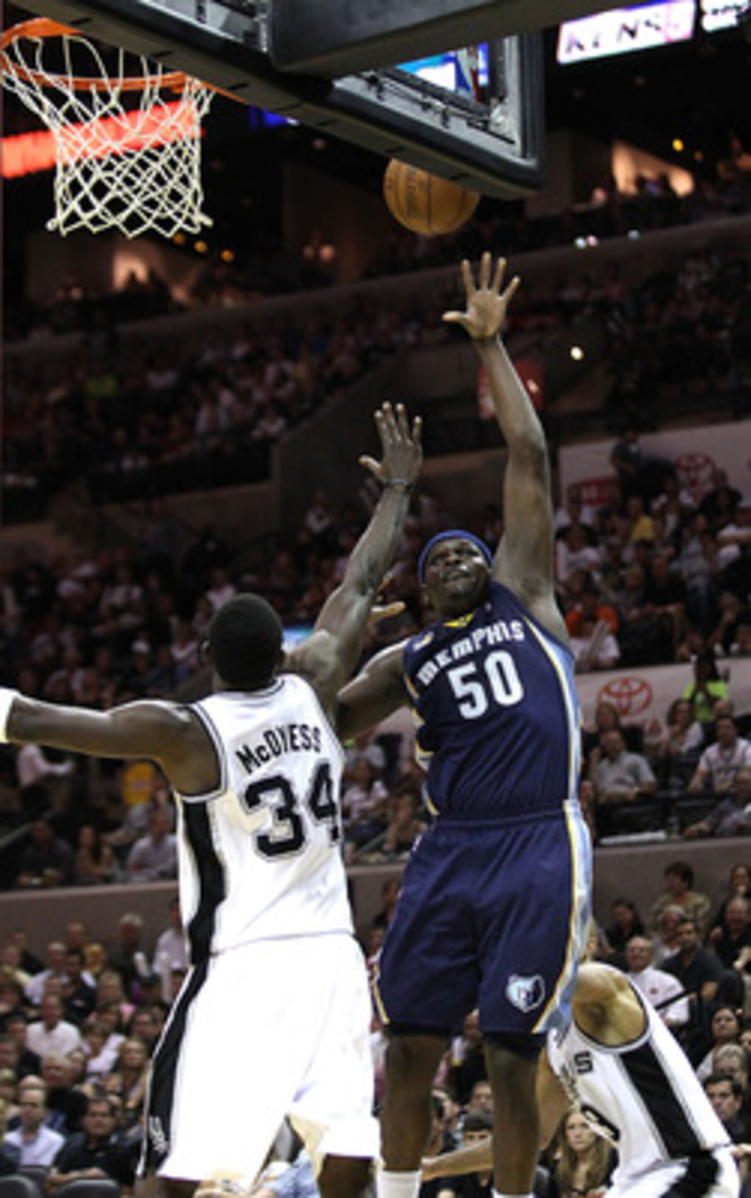 SAN ANTONIO, TX - APRIL 27: Zach Randolph #50 of the Memphis Grizzlies shoots against Antonio McDyess #34 of the San Antionio Spurs in Game Five of the Western Conference Quarterfinals in the 2011 NBA Playoffs on April 27, 2011 at AT&T Center in San Anto SAN ANTONIO, TX - APRIL 27: Zach Randolph #50 of the Memphis Grizzlies shoots against Antonio McDyess #34 of the San Antionio Spurs in Game Five of the Western Conference Quarterfinals in the 2011 NBA Playoffs on April 27, 2011 at AT&T Center in San Anto