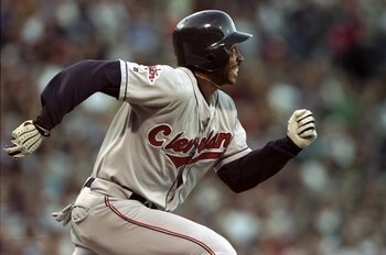 2 Oct 1998:  Kenny Lofton #7 of the Cleveland Indians runs to first base after hitting a home run during an American League Divisional Series game against the Boston Red Sox at Fenway Park in Boston, Massachusetts. The Indians defeated the Red Sox 4-3. Ma