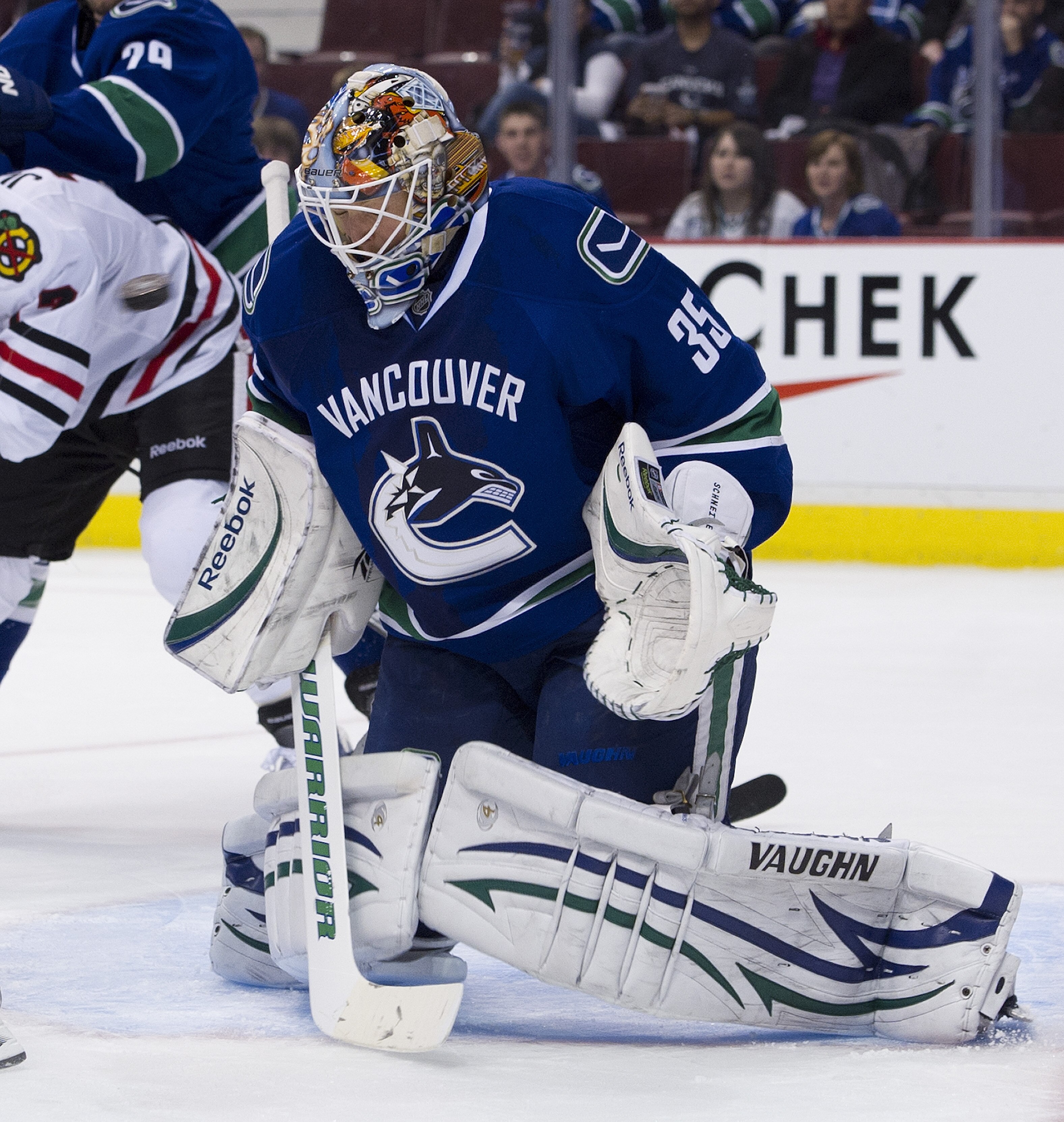 VANCOUVER, CANADA - APRIL 21: The puck flie over the shoulder of goalie Cory Schneider #35 of the Vancouver Canucks and wide of the net during the third period in Game Five of the Western Conference Quarterfinals against the Chicago Blackhawks during the