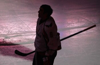 GLENDALE, AZ - FEBRUARY 14:  Alex Ovechkin #8 of the Washington Capitals stands on the ice during the National Anthem before the NHL game against the Phoenix Coyotes at Jobing.com Arena on February 14, 2011 in Glendale, Arizona.  The Coyotes defeated the 