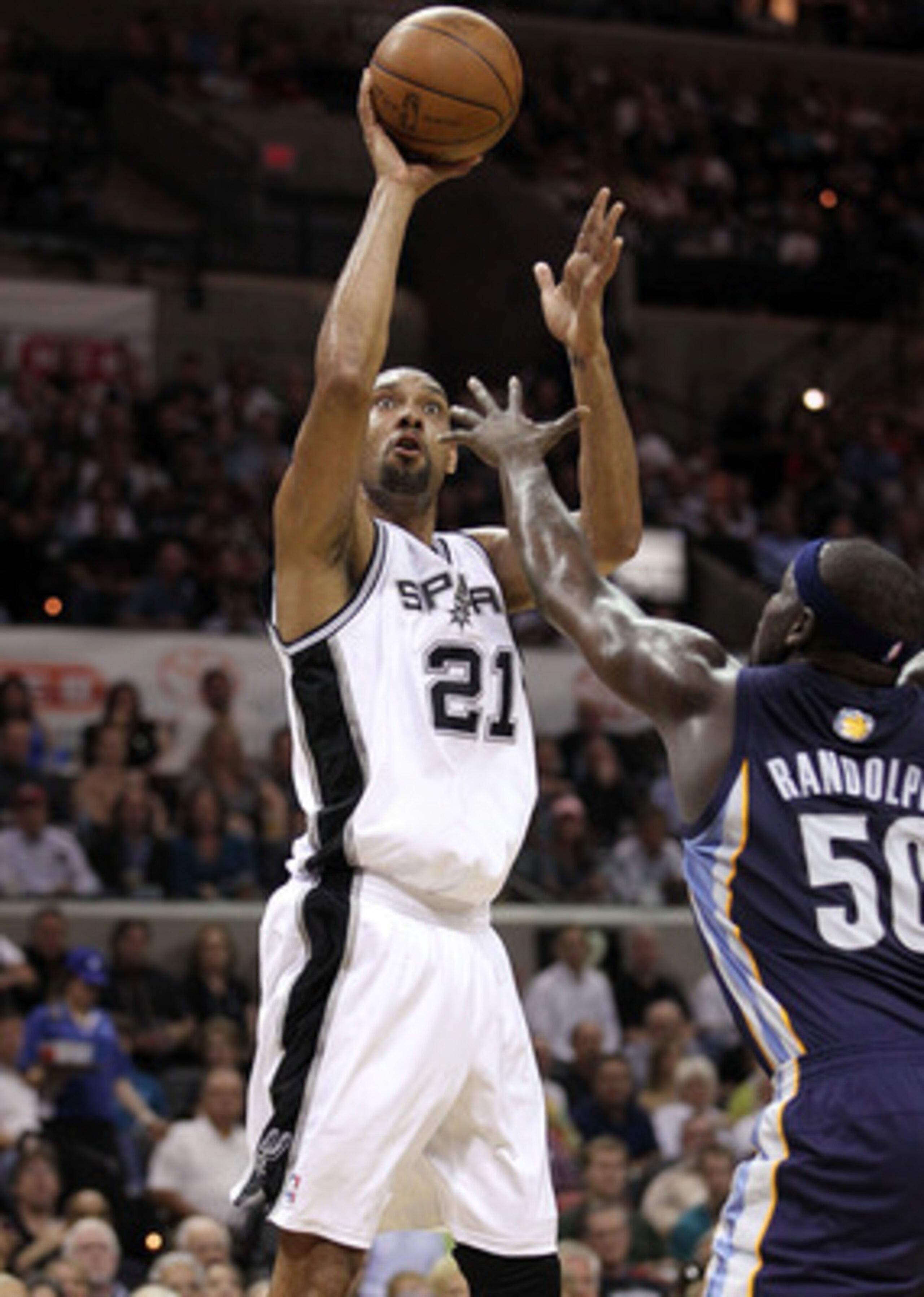 SAN ANTONIO, TX - APRIL 20:  Forward Tim Duncan  #21 of the San Antonio Spurs takes a shot against Zach Randolph #50 of the Memphis Grizzlies in Game Two of the Western Conference Quarterfinals in the 2011 NBA Playoffs on April 20, 2011 at AT&T Center in 