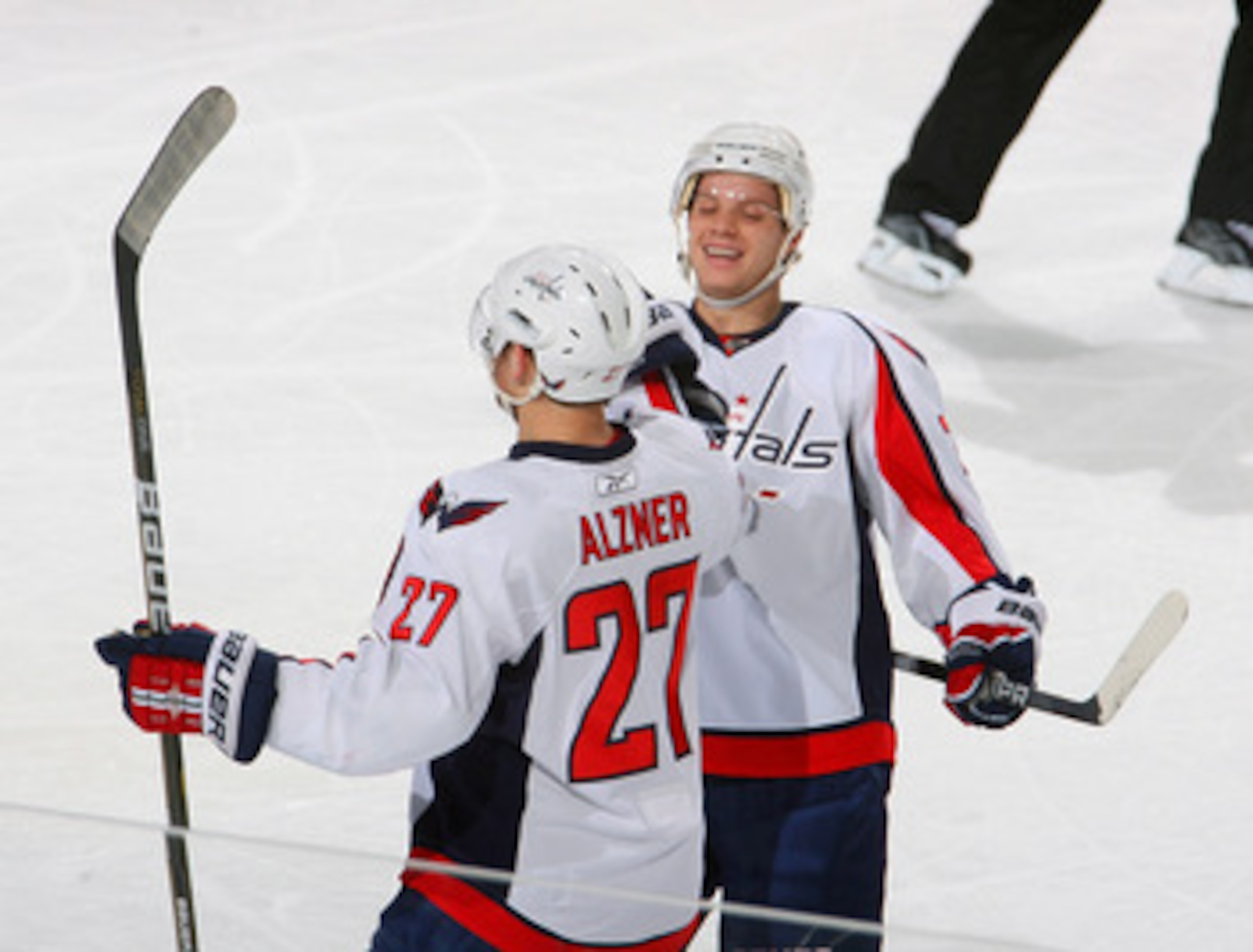BUFFALO, NY - NOVEMBER 13: Karl Alzner #27 and John Carlson #74 of the Washington Capitals celebrate Alzner's goal in the first period against the Buffalo Sabres  at HSBC Arena on November 13, 2010 in Buffalo, New York.  (Photo by Rick Stewart/Getty Image