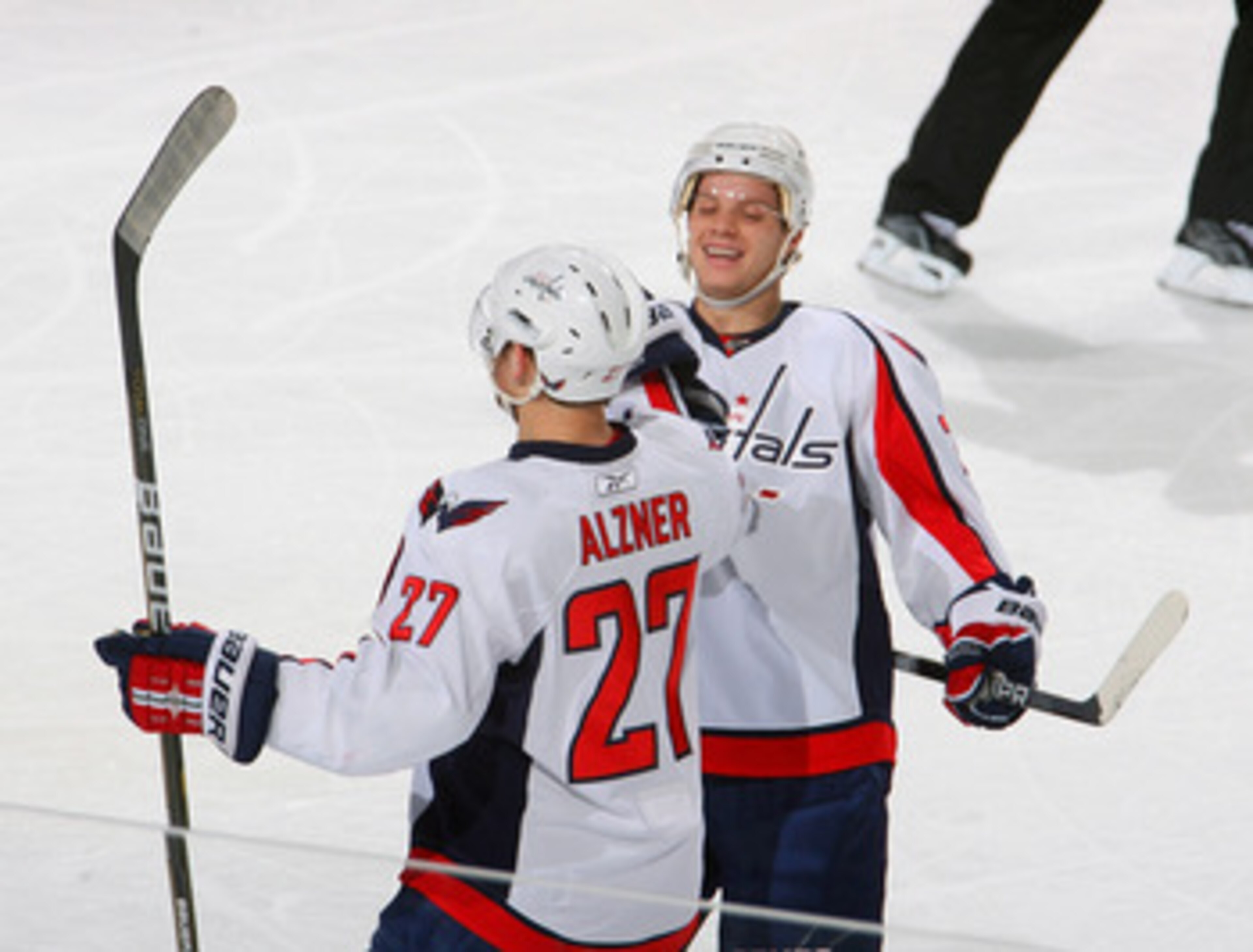 BUFFALO, NY - NOVEMBER 13: Karl Alzner #27 and John Carlson #74 of the Washington Capitals celebrate Alzner's goal in the first period against the Buffalo Sabres  at HSBC Arena on November 13, 2010 in Buffalo, New York.  (Photo by Rick Stewart/Getty Image