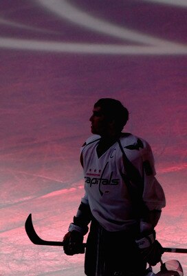 GLENDALE, AZ - FEBRUARY 14:  Alex Ovechkin #8 of the Washington Capitals stands on the ice during the National Anthem before the NHL game against the Phoenix Coyotes at Jobing.com Arena on February 14, 2011 in Glendale, Arizona.  (Photo by Christian Peter