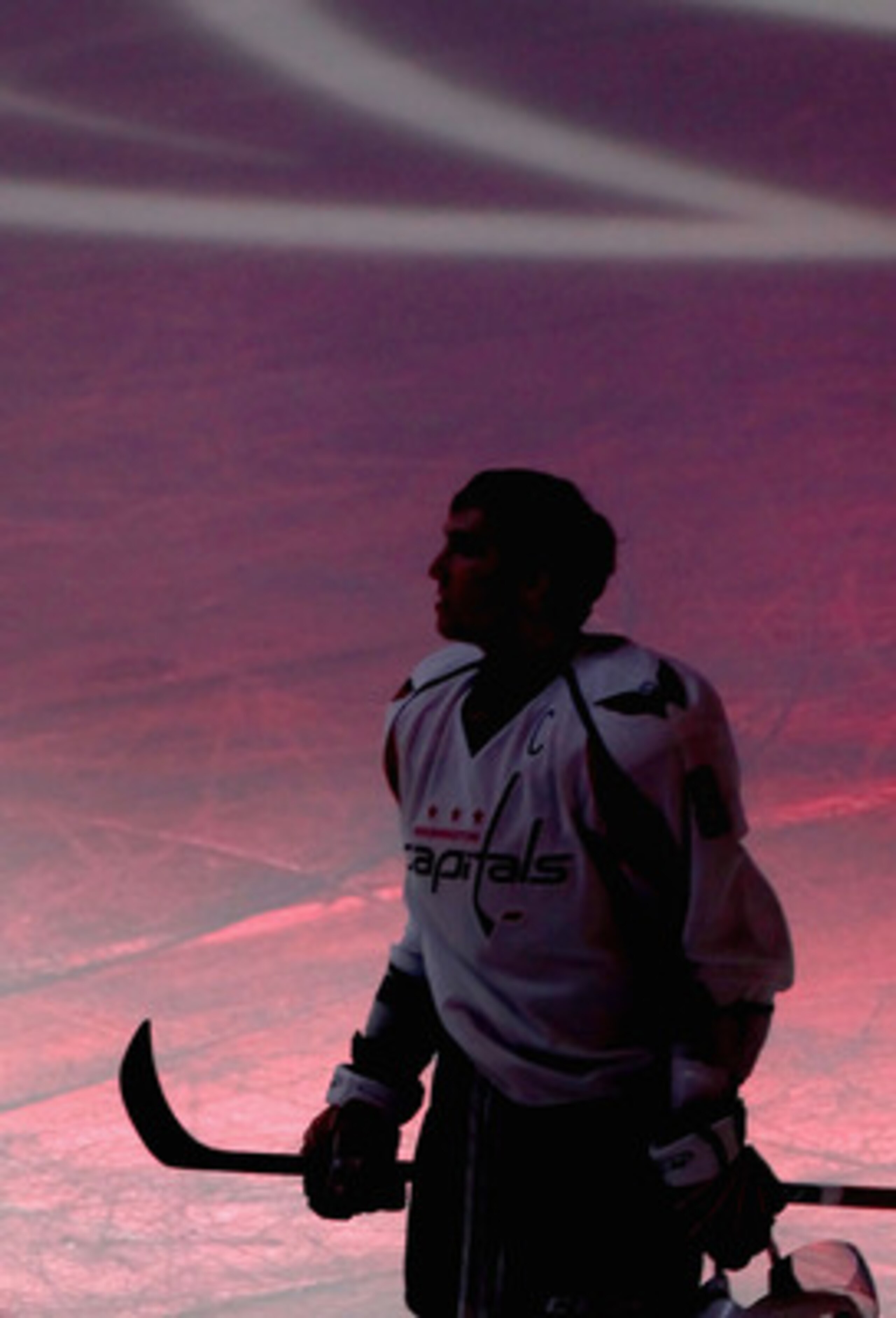GLENDALE, AZ - FEBRUARY 14:  Alex Ovechkin #8 of the Washington Capitals stands on the ice during the National Anthem before the NHL game against the Phoenix Coyotes at Jobing.com Arena on February 14, 2011 in Glendale, Arizona.  (Photo by Christian Peter