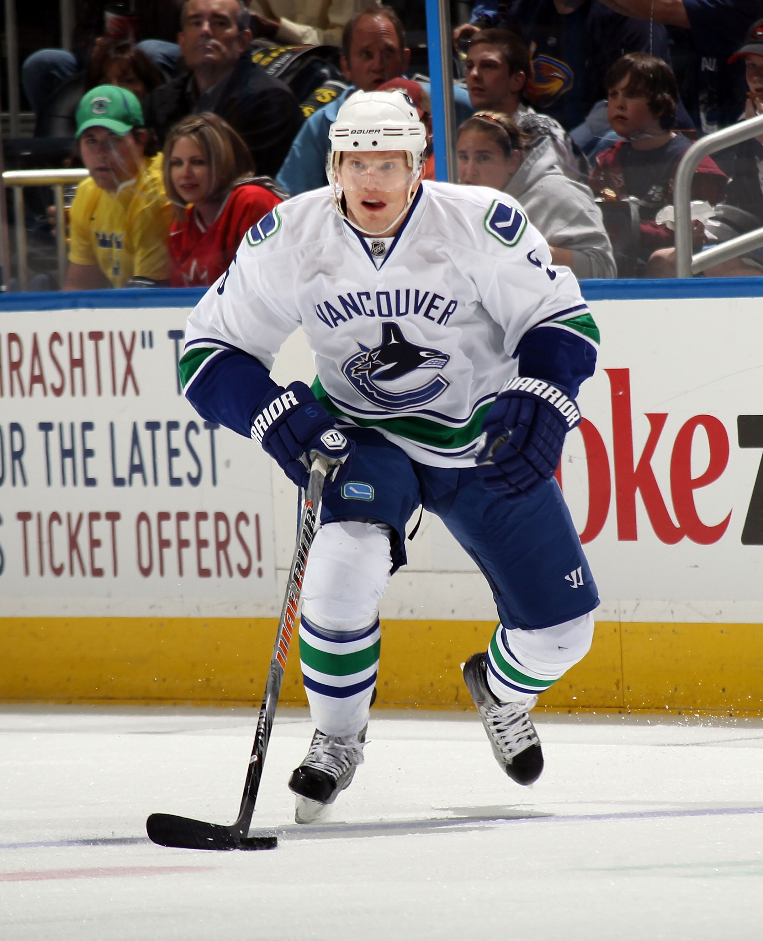 ATLANTA, GA - MARCH 25:  Christian Ehrhoff #5 of the Vancouver Canucks skates against the Atlanta Thrashers at the Philips Arena on March 25, 2011 in Atlanta, Georgia.  (Photo by Bruce Bennett/Getty Images)