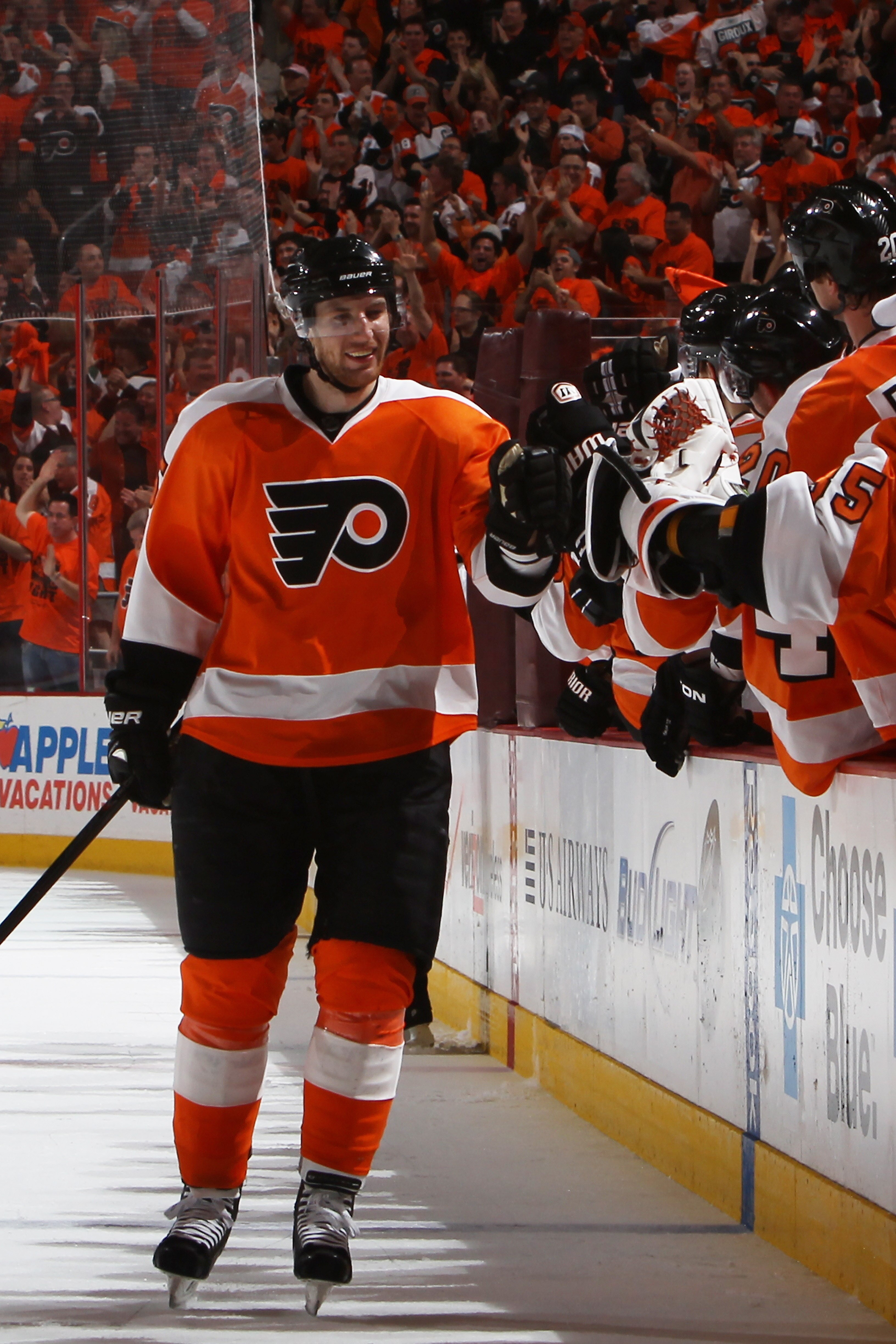 PHILADELPHIA, PA - APRIL 26:  Ville Leino #22 of the Philadelphia Flyers celebrates with teammmates after scoring a first period goal against the Buffalo Sabres in Game Seven of the Eastern Conference Quarterfinals during the 2011 NHL Stanley Cup Playoffs