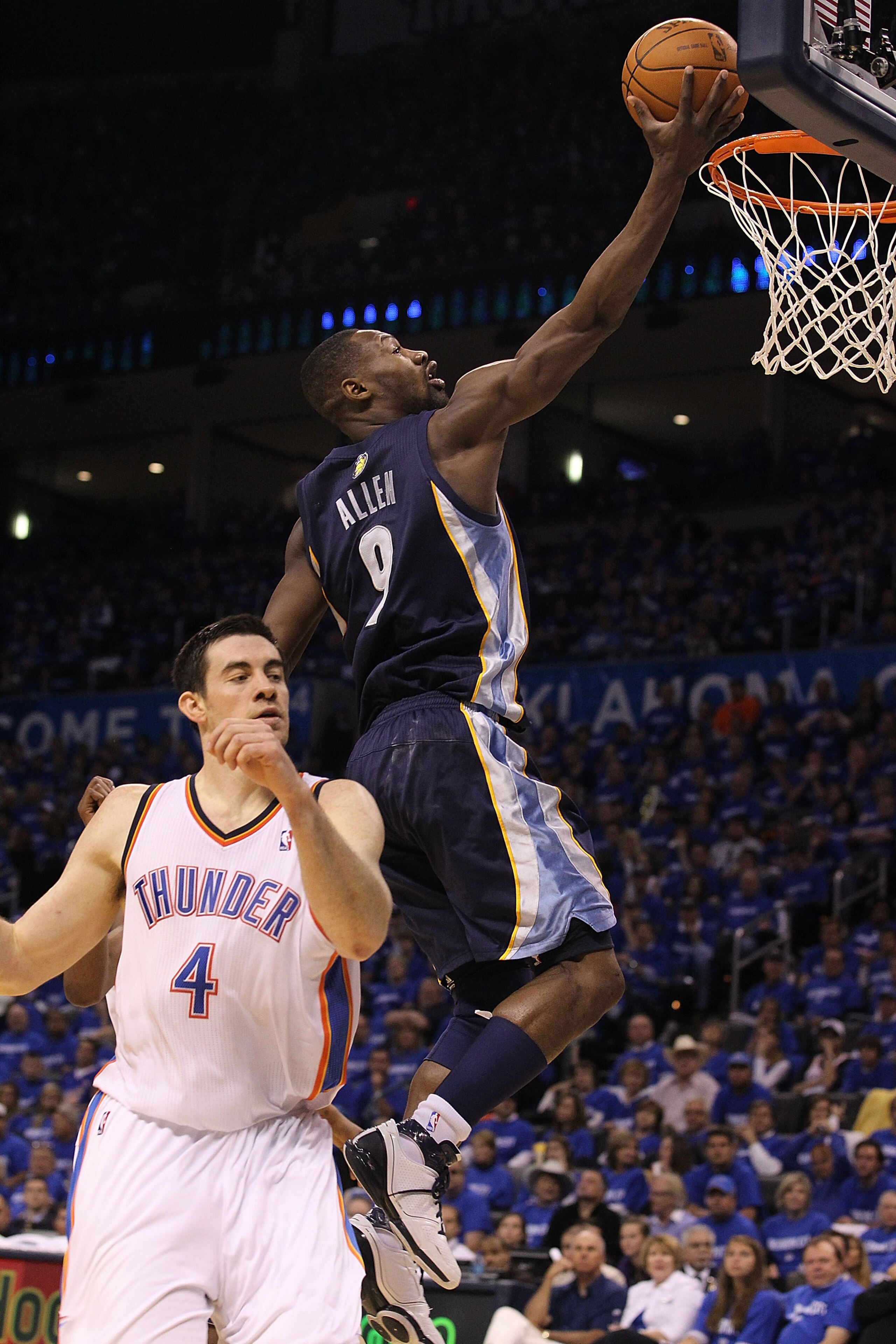 OKLAHOMA CITY, OK - MAY 01:  Guard Tony Allen #9 of the Memphis Grizzlies takes a shot against Nick Collison #4 of the Oklahoma City Thunder in Game One of the Western Conference Semifinals in the 2011 NBA Playoffs on May 1, 2011 at Oklahoma City Arena in