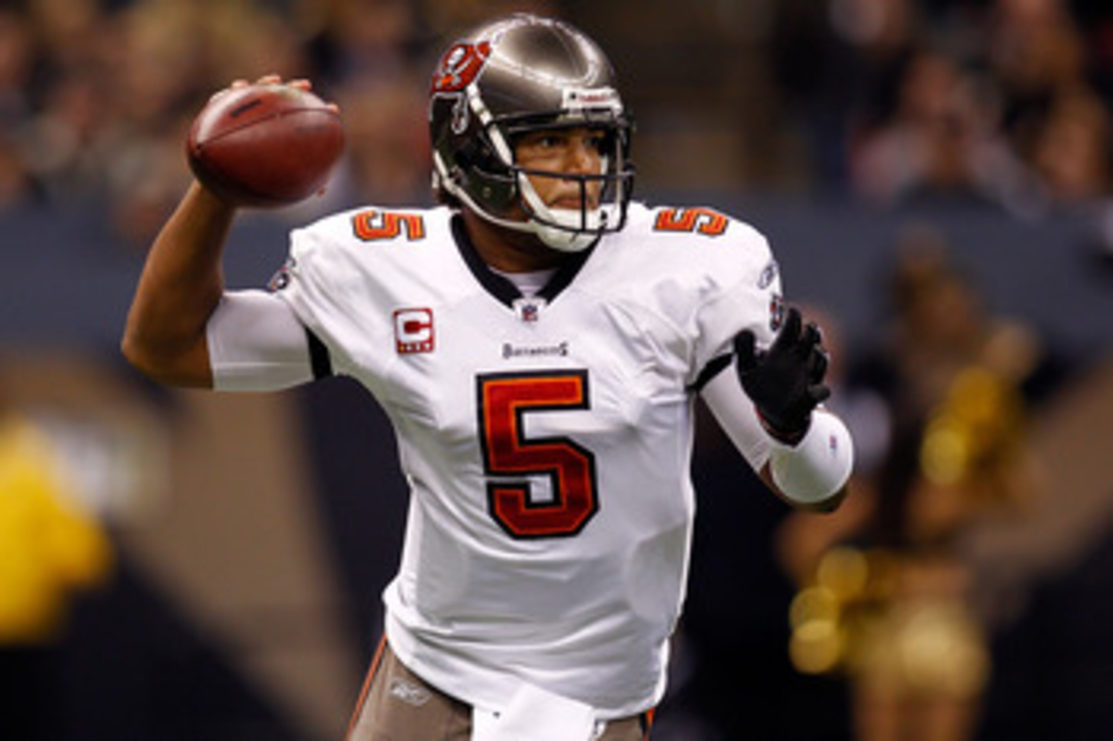 NEW ORLEANS, LA - JANUARY 02:  Quarterback Josh Freeman #5  of the Tampa Bay Buccaneers throws the ball during the game against the New Orleans Saints at the Louisiana Superdome on January 2, 2011 in New Orleans, Louisiana.  (Photo by Chris Graythen/Getty