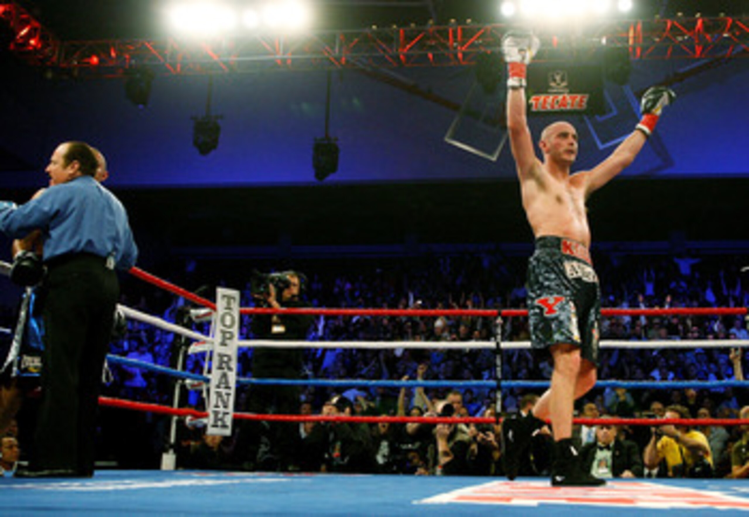 YOUNGSTOWN, OH - DECEMBER 19:  Kelly Pavlik celebrates after defeating Miguel Espino for the World Middleweight Championship during their match at the Beeghly Center on December 19, 2009 in Youngstown, Ohio.  (Photo by Jared Wickerham/Getty Images)