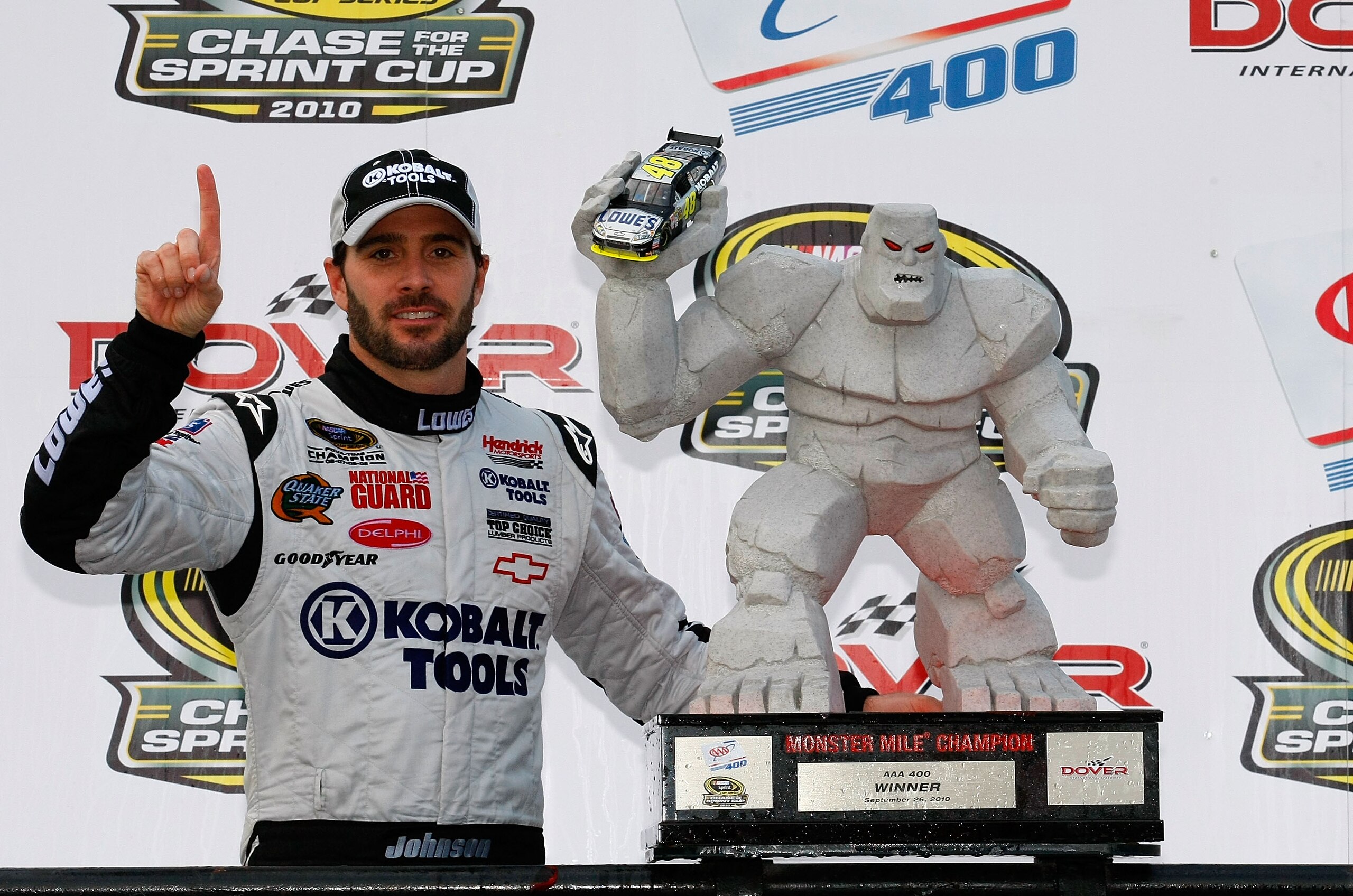 DOVER, DE - SEPTEMBER 26: Jimmie Johnson, driver of the #48 Lowe's/Kobalt Tools Chevrolet, celebrates in Victory Lane after winning the NASCAR Sprint Cup Series AAA 400 at Dover International Speedway on September 26, 2010 in Dover, Delaware. (Photo by G DOVER, DE - SEPTEMBER 26: Jimmie Johnson, driver of the #48 Lowe's/Kobalt Tools Chevrolet, celebrates in Victory Lane after winning the NASCAR Sprint Cup Series AAA 400 at Dover International Speedway on September 26, 2010 in Dover, Delaware. (Photo by G