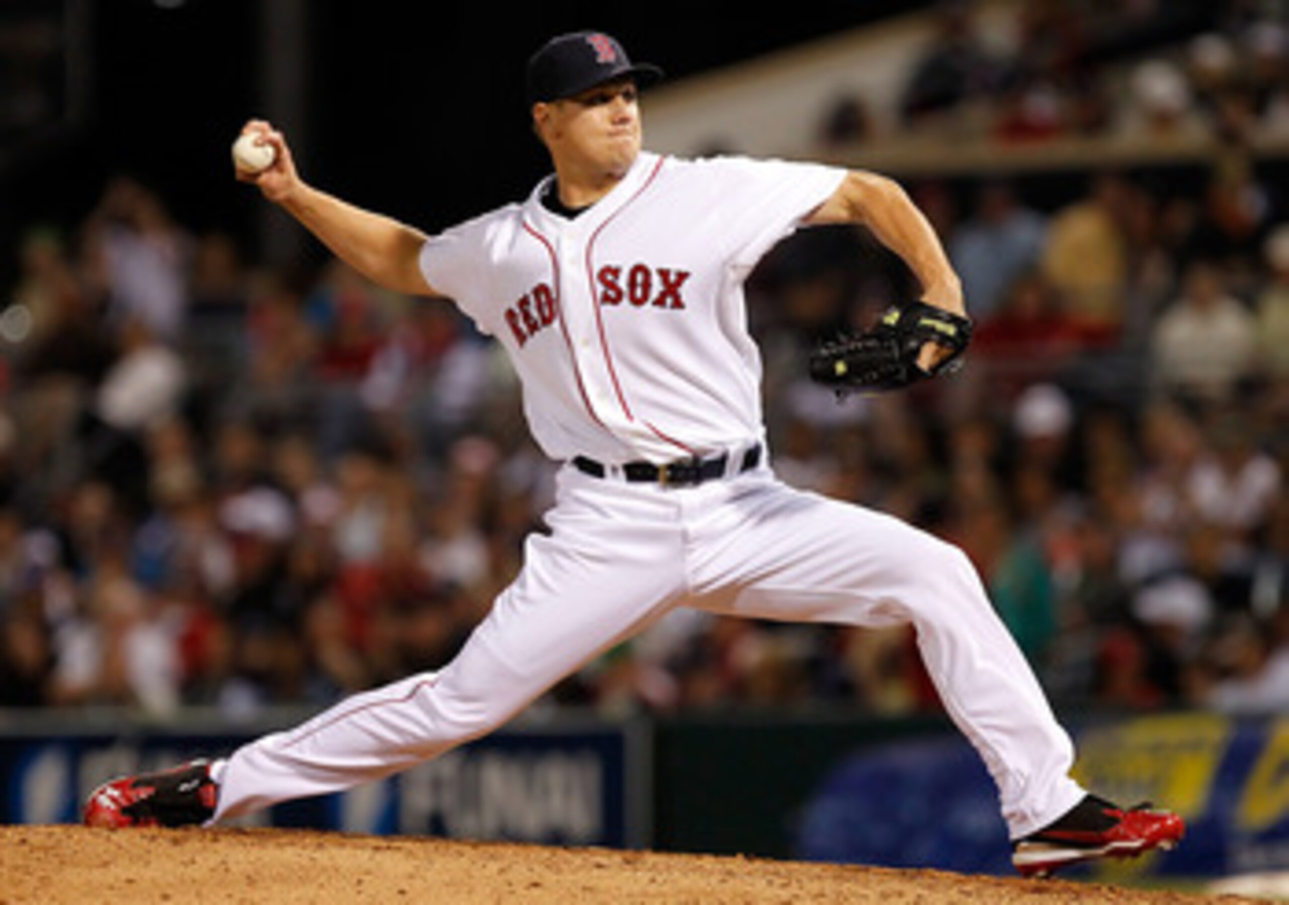 FORT MYERS, FL - MARCH 14:  Pitcher Jonathan Papelbon #58 of the Boston Red Sox pitches against the New York Yankees during a Grapefruit League Spring Training Game at City of Palms Park on March 14, 2011 in Fort Myers, Florida.  (Photo by J. Meric/Getty 