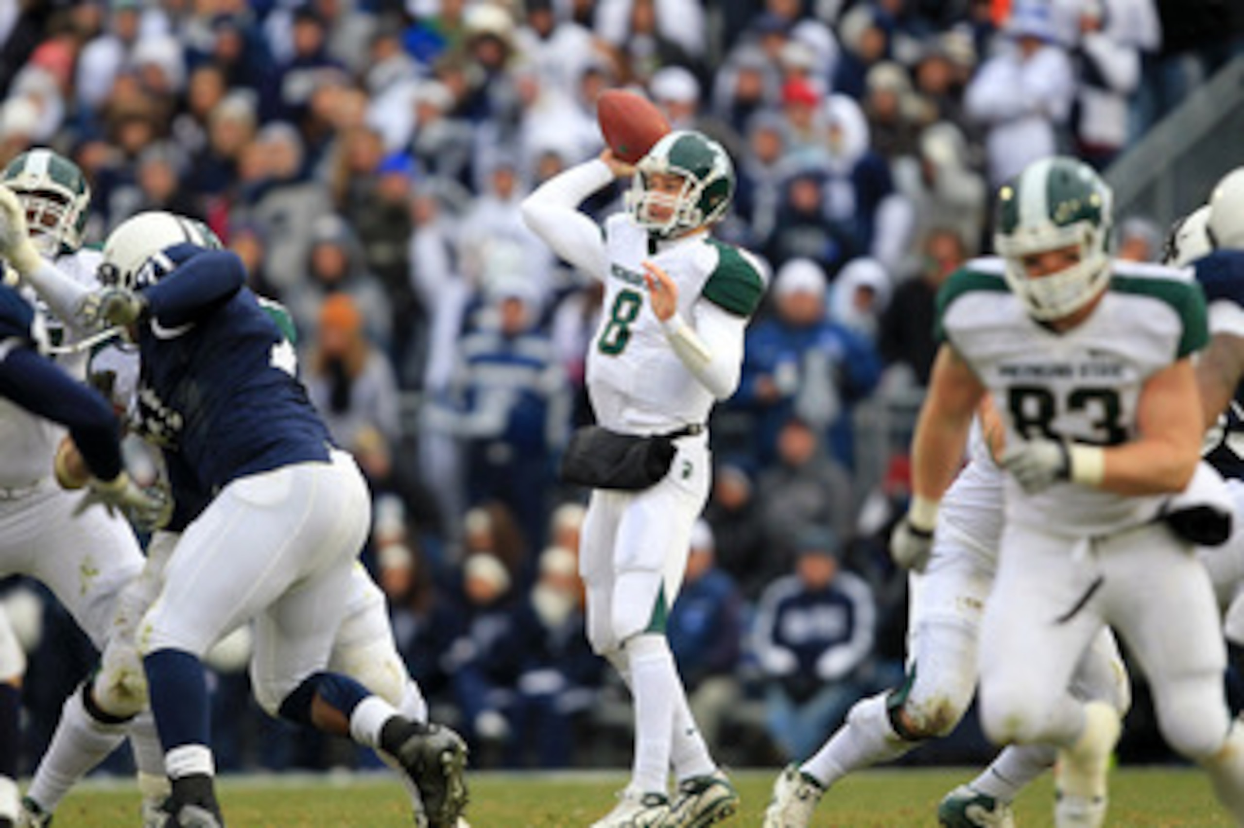 STATE COLLEGE, PA - NOVEMBER 27: Quarterback Kirk Cousins #8 of the Michigan State Spartans throws a pass during a game against the Penn State Nittany Lions on November 27, 2010 at Beaver Stadium in State College, Pennsylvania. The Spartans won 28-22. (Ph