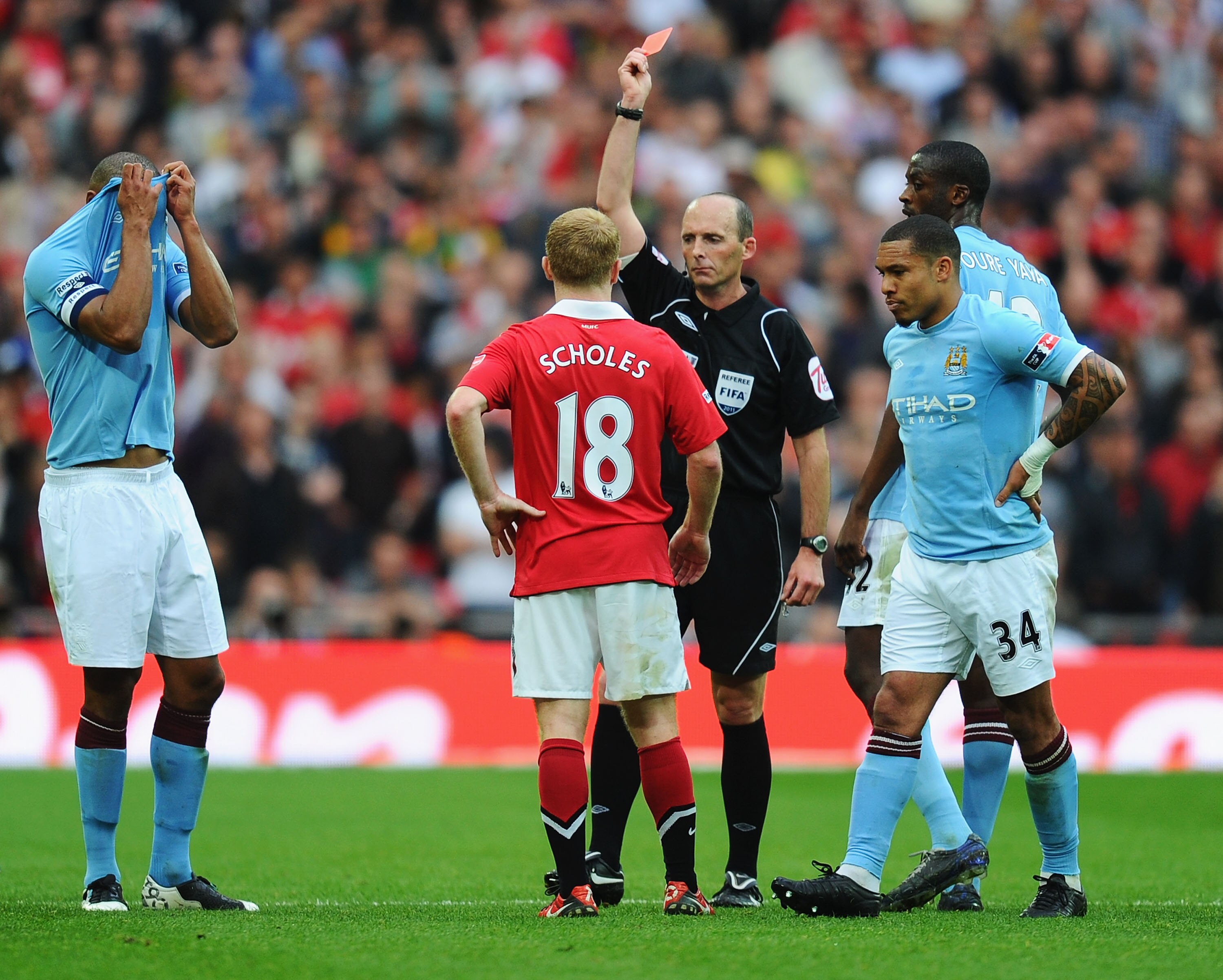 LONDON, ENGLAND - APRIL 16:  Referee Mike Dean shows Paul Scholes a red card after his high footed challenge Pablo Zabaleta of Manchester City during the FA Cup sponsored by E.ON semi final match between Manchester City and Manchester United at Wembley St