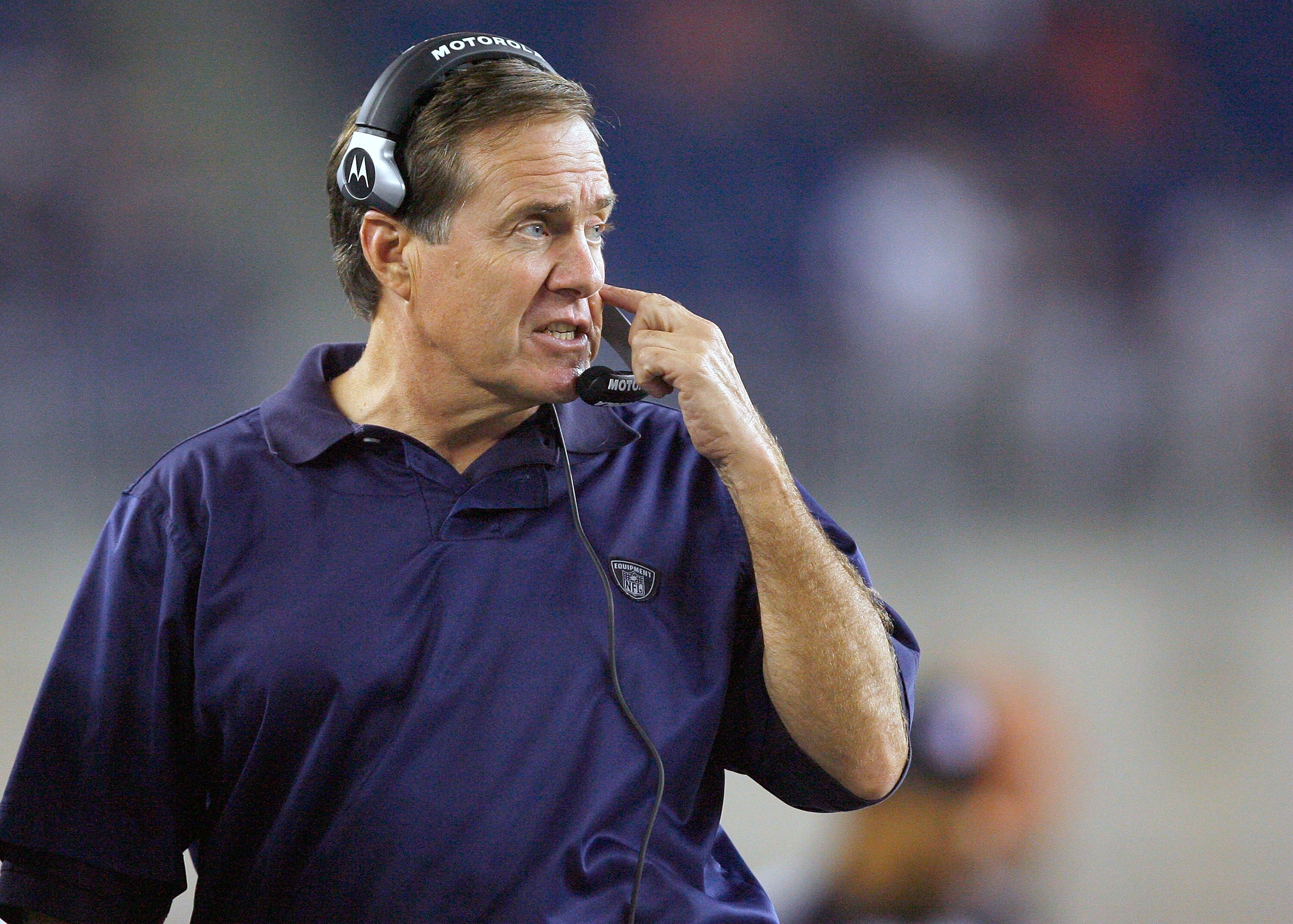 FOXBORO, MA - AUGUST 30: New England Patriots coach Bill Belichick watches the action gainst the New York Giants at Gilette Stadium on August 30, 2007 in Foxboro, Massachusetts. (Photo by Jim Rogash/Getty Images) FOXBORO, MA - AUGUST 30: New England Patriots coach Bill Belichick watches the action gainst the New York Giants at Gilette Stadium on August 30, 2007 in Foxboro, Massachusetts. (Photo by Jim Rogash/Getty Images)