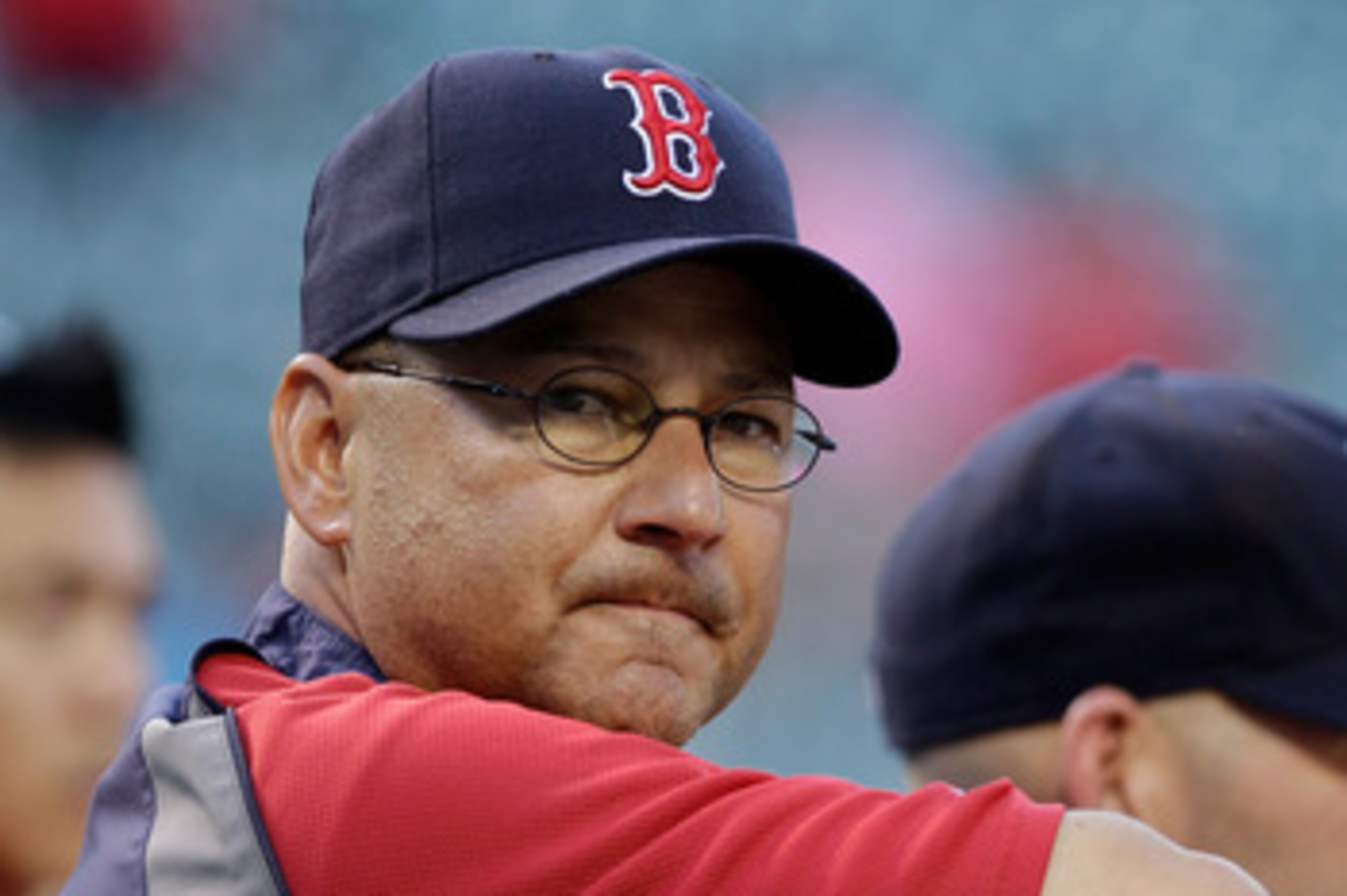 BALTIMORE, MD - APRIL 26: Manager Terry Francona #47 of the Boston Red Sox watches as his team take batting practice before the start of a game against the Baltimore Orioles at Oriole Park at Camden Yards on April 26, 2011 in Baltimore, Maryland.  (Photo