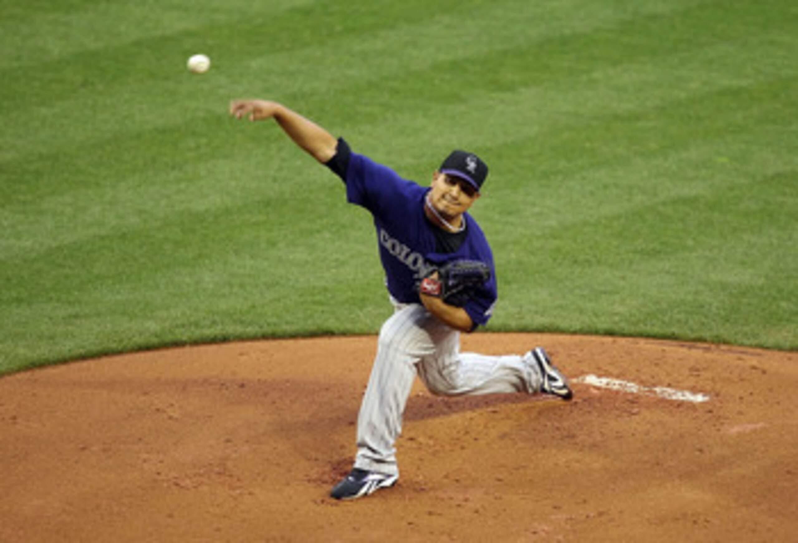 PHOENIX, AZ - MAY 04:  Starting pitcher Jhoulys Chacin #45 of the Colorado Rockies pitches against the Arizona Diamondbacks during the Major League Baseball game at Chase Field on May 4, 2011 in Phoenix, Arizona.  (Photo by Christian Petersen/Getty Images