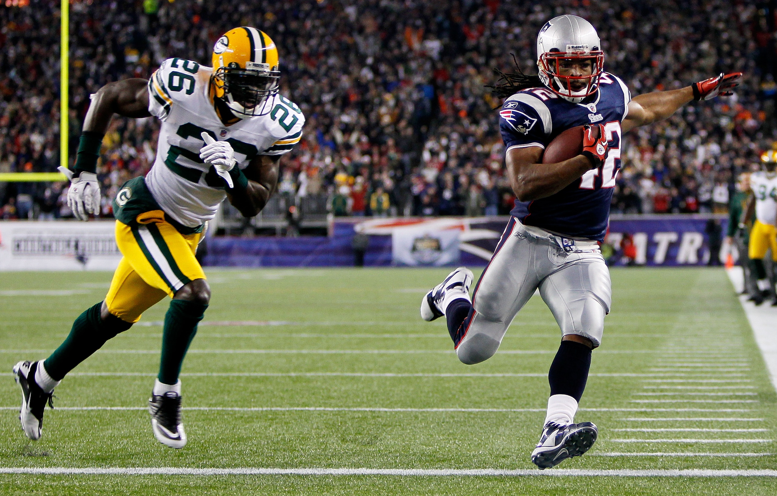 FOXBORO, MA - DECEMBER 19:  Running back BenJarvus Green-Ellis #42 of the New England Patriots runs 33 yards to score a touchdown in the first quarter against safety Charlie Peprah #26 of the Green Bay Packers at Gillette Stadium on December 19, 2010 in F