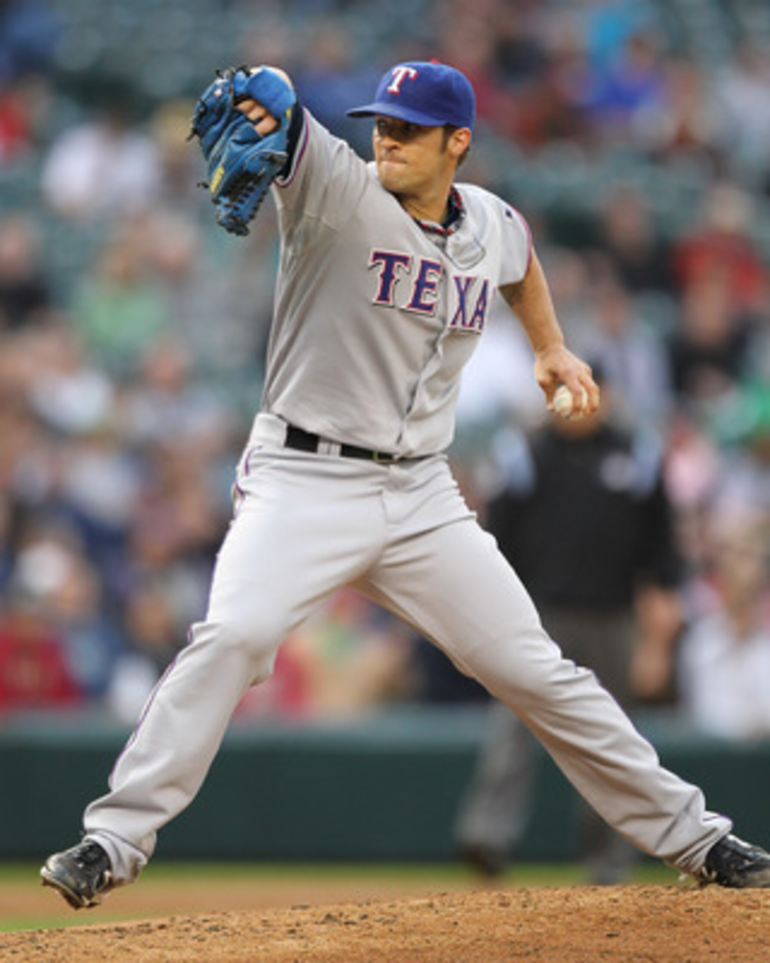 SEATTLE - MAY 04:  Starting pitcher C.J. Wilson #36 of the Texas Rangers pitches against the Seattle Mariners at Safeco Field on May 4, 2011 in Seattle, Washington. (Photo by Otto Greule Jr/Getty Images)