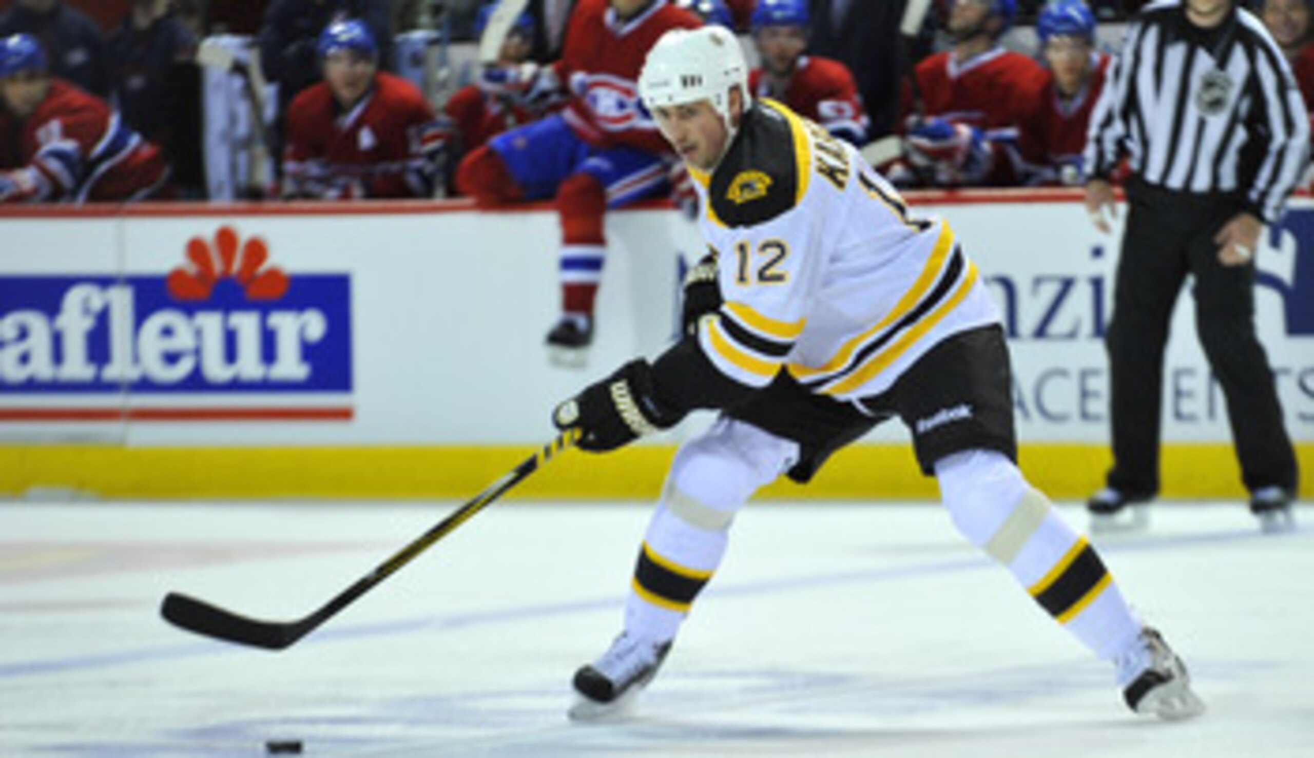 MONTREAL, CANADA - APRIL 18:  Tomas Kaberle #12 of the Boston Bruins controls the puck at the blueline in Game Three of the Eastern Conference Quarterfinals against the Montreal Canadiens during the 2011 NHL Stanley Cup Playoffs at the Bell Centre on Apri
