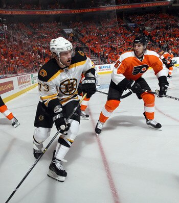 PHILADELPHIA, PA - APRIL 30: Michael Ryder #73 of the Boston Bruins skates against Braydon Coburn #5 of the Philadelphia Flyers in Game One of the Eastern Conference Semifinals during the 2011 NHL Stanley Cup Playoffs at the Wells Fargo Center on April 30