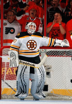 PHILADELPHIA, PA - MAY 02:  Goalie Tim Thomas #30 of the Boston Bruins stands frustrated as Philadelphia Flyers celebrate a Flyers goal early during the first period of Game Two of the Eastern Conference Semifinals during the 2011 NHL Stanley Cup Playoffs