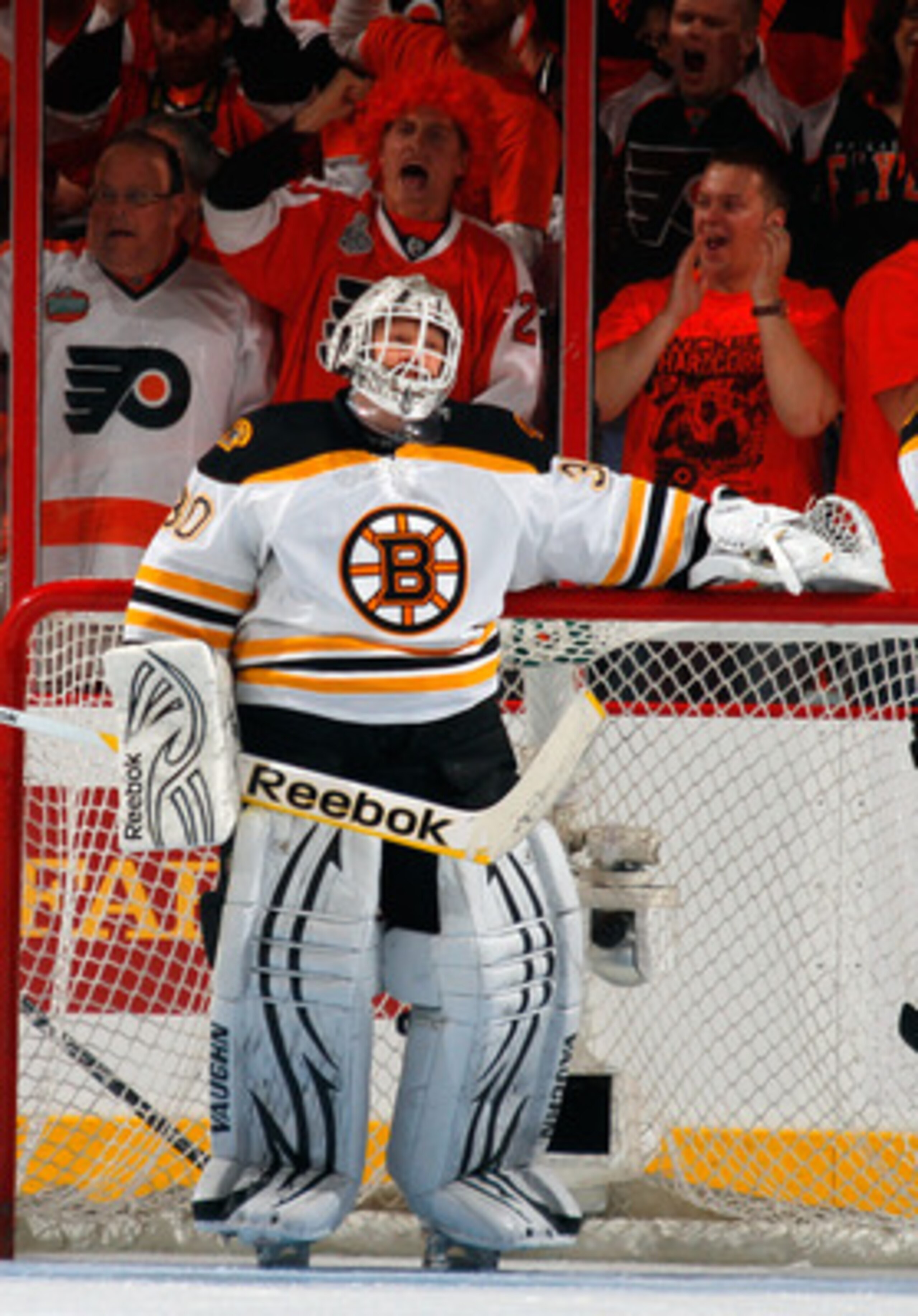 PHILADELPHIA, PA - MAY 02:  Goalie Tim Thomas #30 of the Boston Bruins stands frustrated as Philadelphia Flyers celebrate a Flyers goal early during the first period of Game Two of the Eastern Conference Semifinals during the 2011 NHL Stanley Cup Playoffs