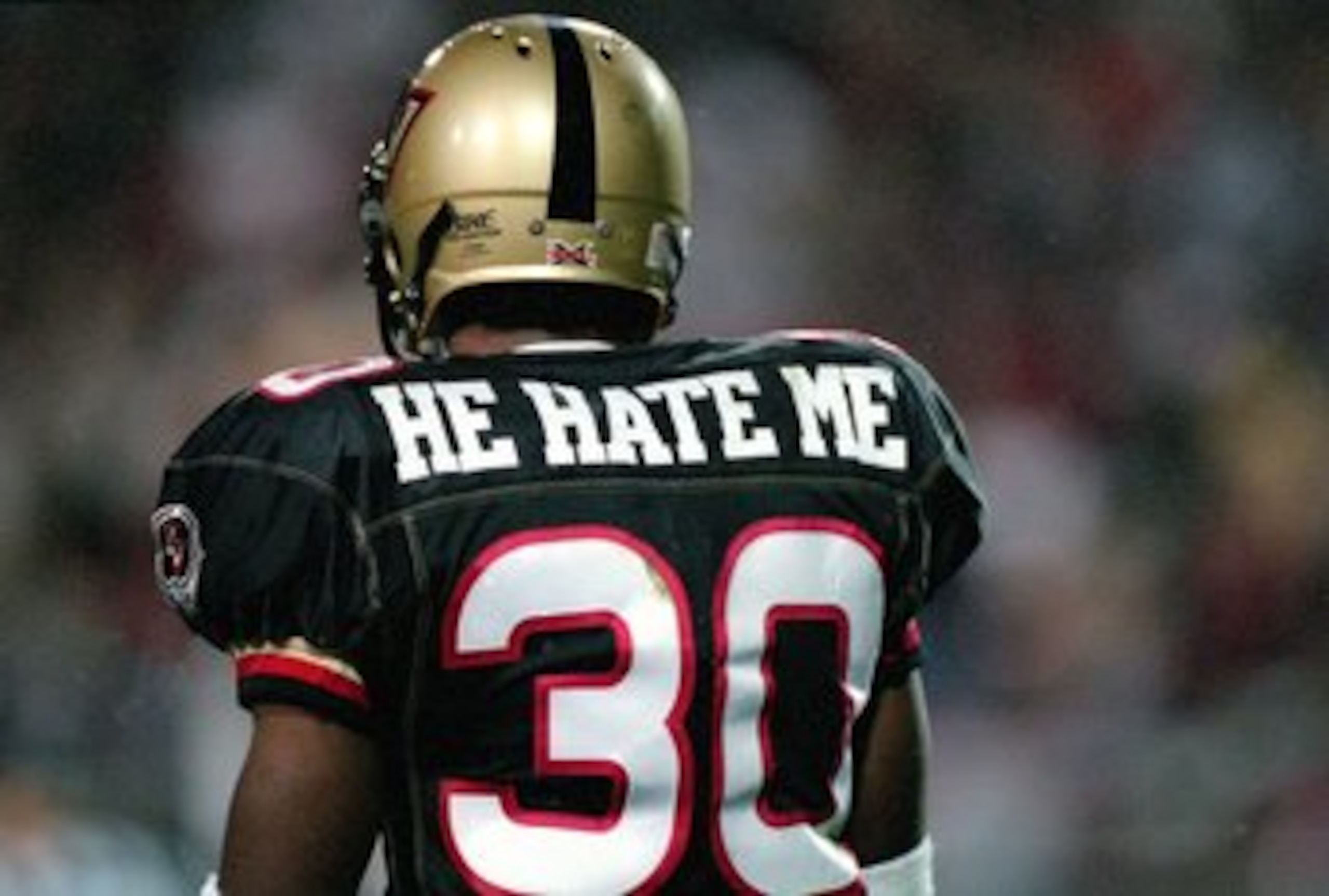 3 Feb 2001:  A rear view of Rod Smart #30 of the Las Vegas Outlaws walking on the field during the game against the New York/New Jersey Hitmen at the Sam Boyd Stadium in Las Vegas, Nevada.  The Outlaws defeated the Hitmen 19-0.Mandatory Credit: Todd Warsh