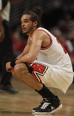 CHICAGO, IL - MAY 04: Joakim Noah #13 of the Chicago Bulls rests at center court after a called time-out against the Atlanta Hawks in Game Two of the Eastern Conference Semifinals in the 2011 NBA Playoffs at the United Center on May 4, 2011 in Chicago, Il