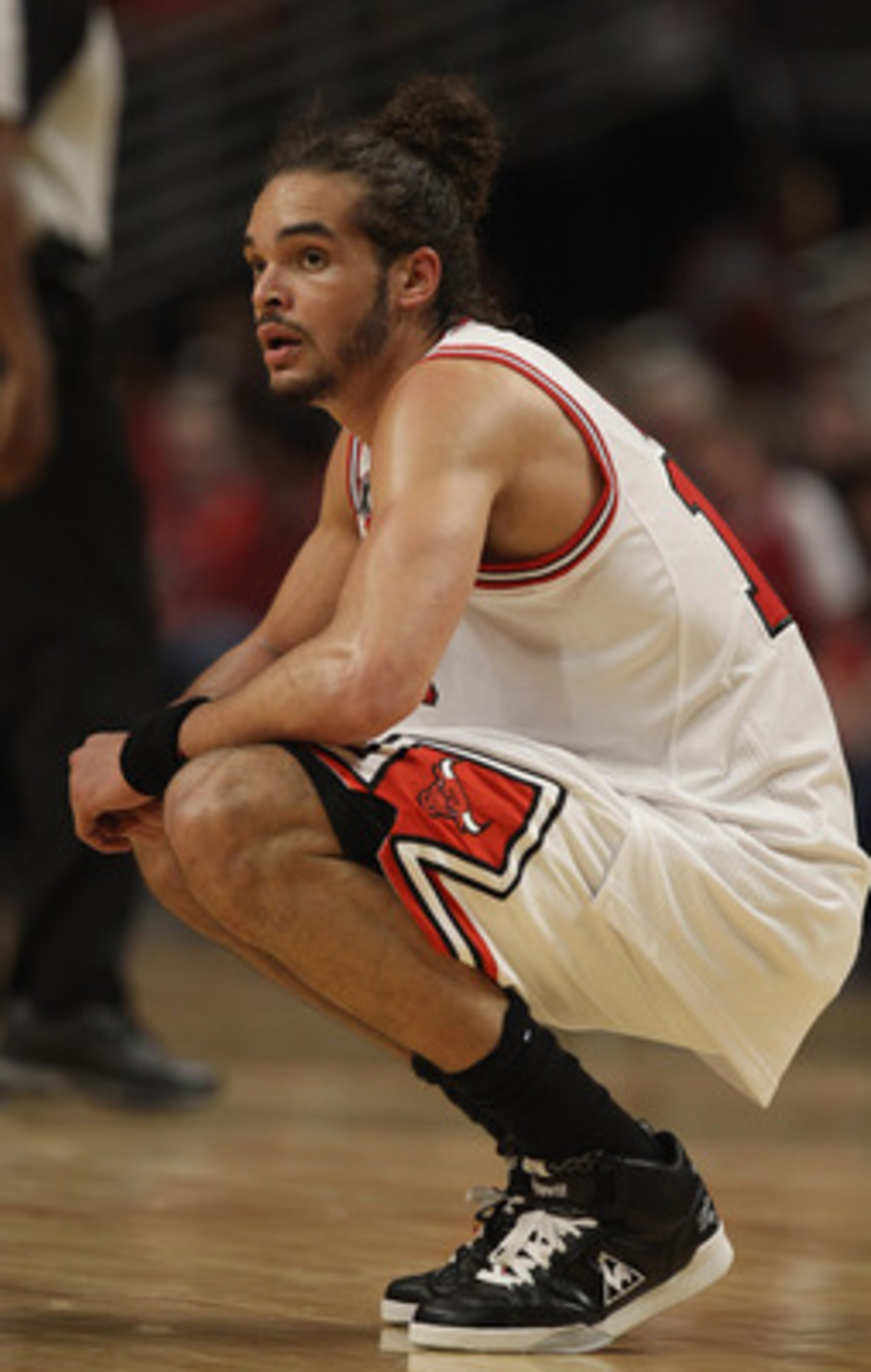 CHICAGO, IL - MAY 04: Joakim Noah #13 of the Chicago Bulls rests at center court after a called time-out against the Atlanta Hawks in Game Two of the Eastern Conference Semifinals in the 2011 NBA Playoffs at the United Center on May 4, 2011 in Chicago, Il
