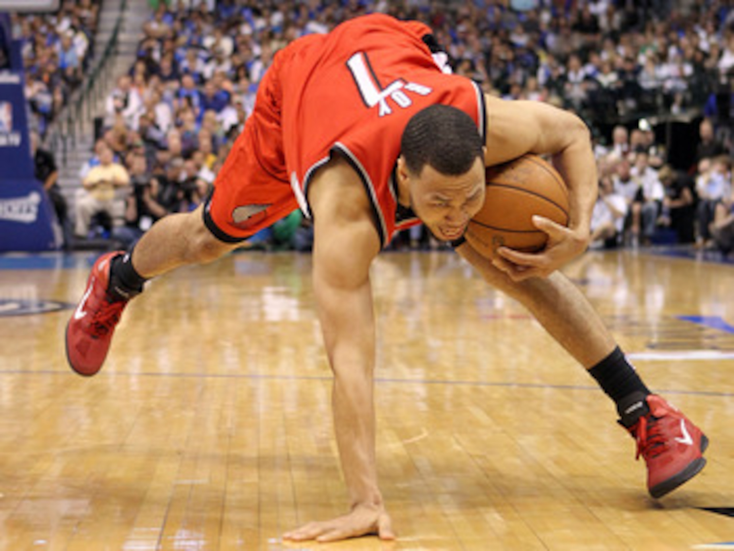 DALLAS, TX - APRIL 16:  Guard Brandon Roy #1 of the Portland Trail Blazers loses his balance in Game One of the Western Conference Quarterfinals during the 2011 NBA Playoffs on April 16, 2011 at American Airlines Center in Dallas, Texas.  NOTE TO USER: Us